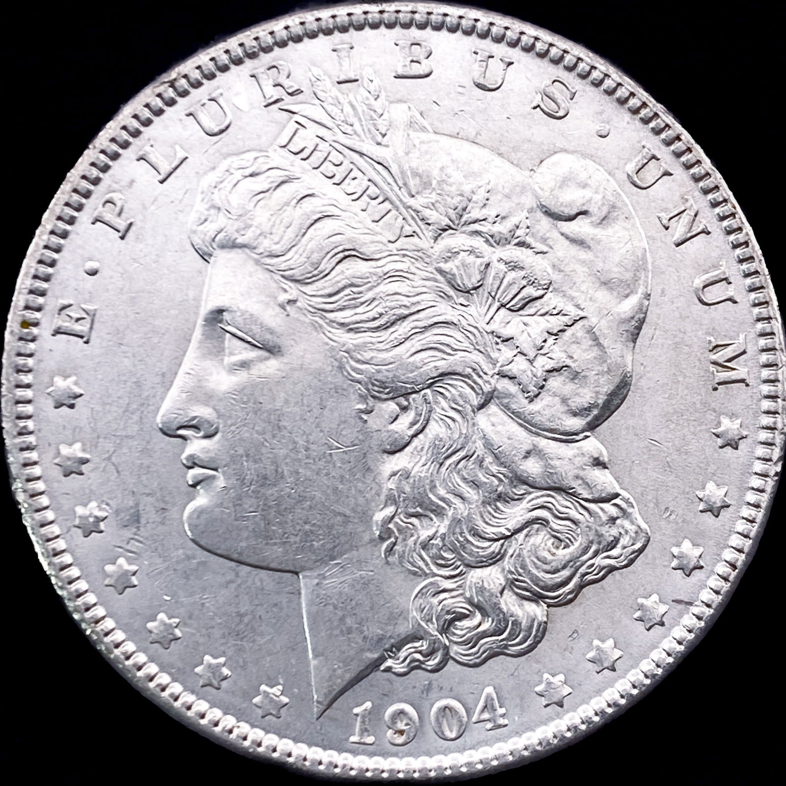 1904 Silver Morgan Dollar CLOSELY UNCIRCULATED (1 of 2)