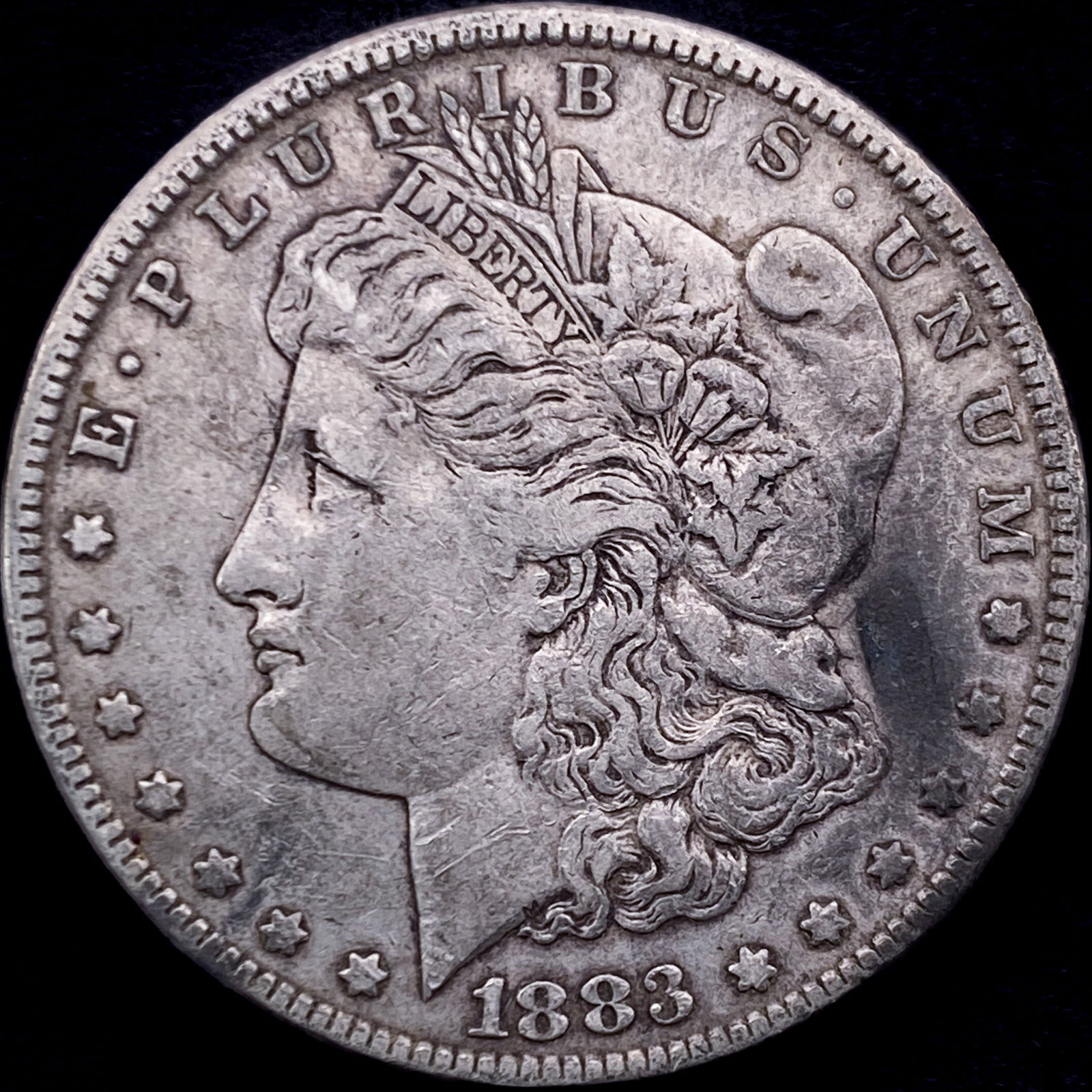 1883 Morgan Silver Dollar NEARLY UNCIRCULATED (1 of 2)