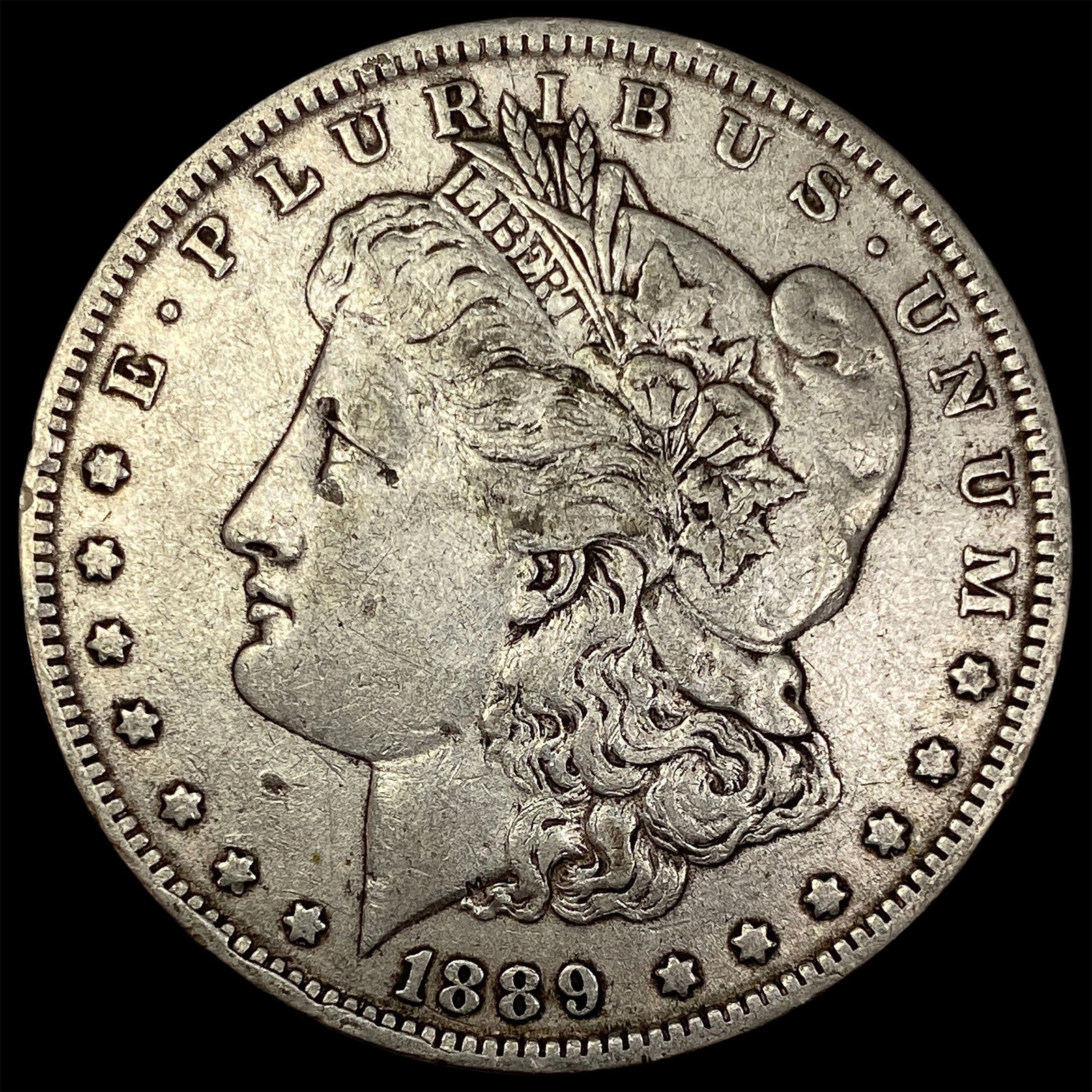 1889-O Silver Morgan Dollar NEARLY UNCIRCULATED (1 of 2)