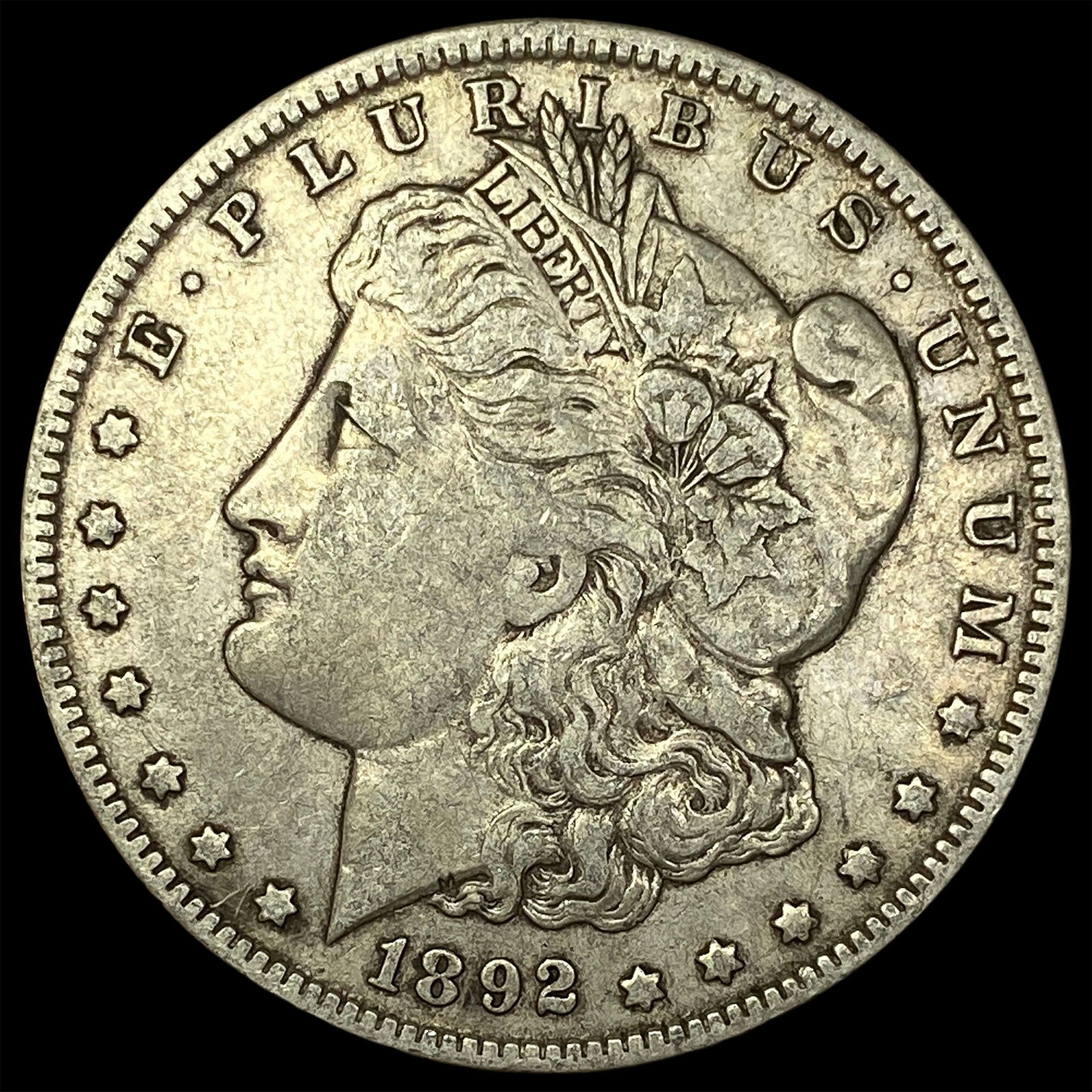 1892-O Silver Morgan Dollar NEARLY UNCIRCULATED (1 of 2)