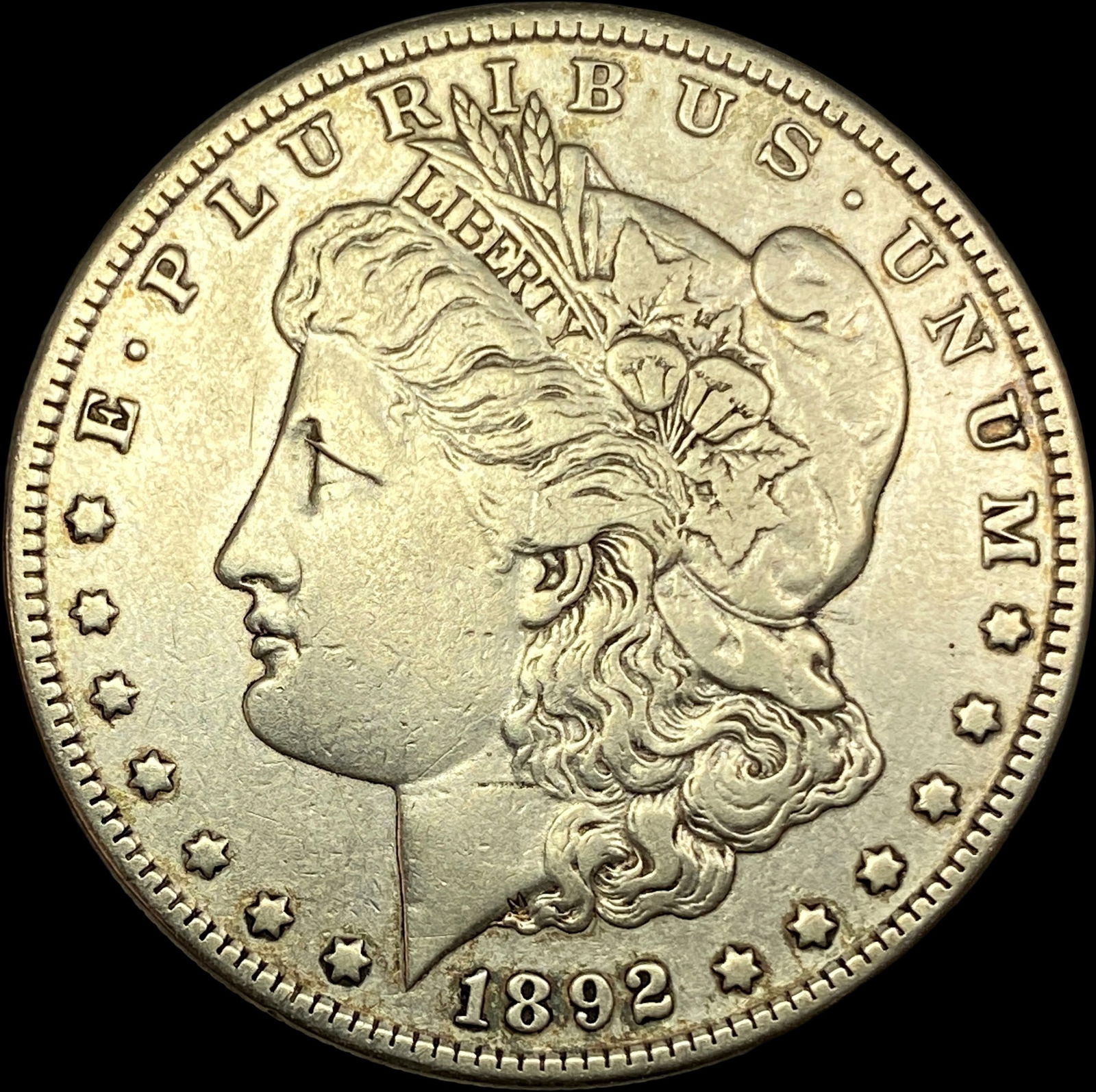 1892-S Silver Morgan Dollar NEARLY  UNCIRCULATED (1 of 2)