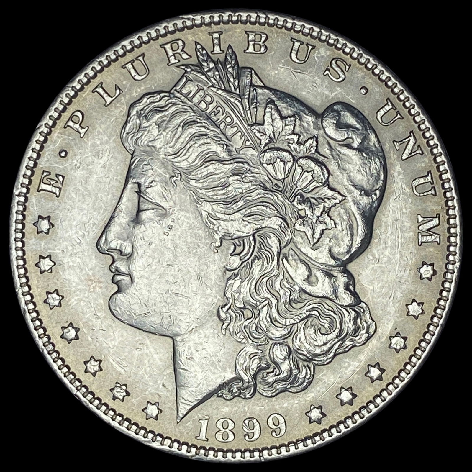1899 Silver Morgan Dollar CLOSELY  UNCIRCULATED (1 of 2)