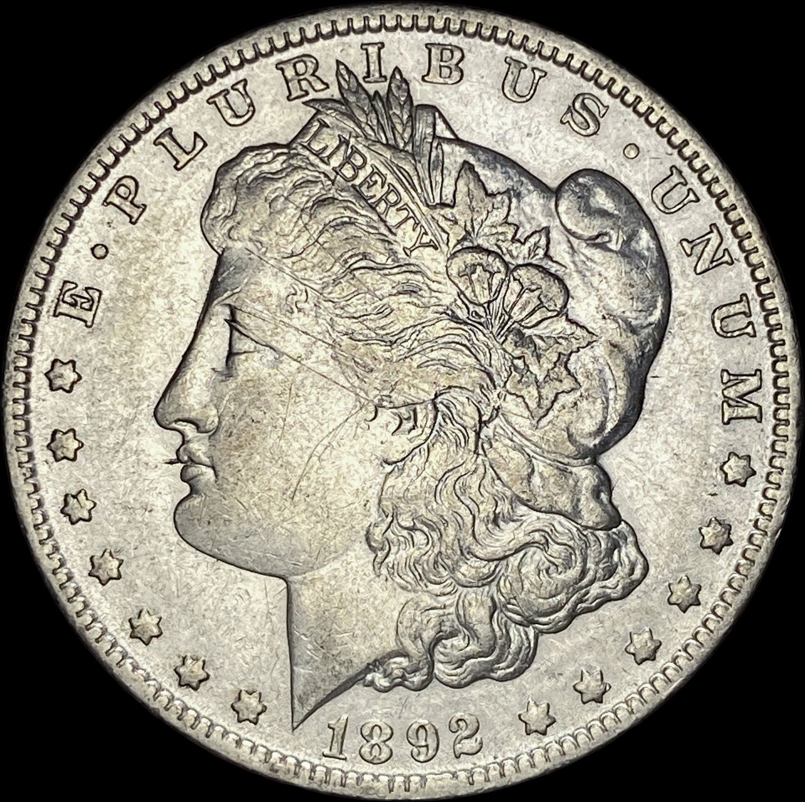 1892-O Silver Morgan Dollar CLOSELY UNCIRCULATED (1 of 2)