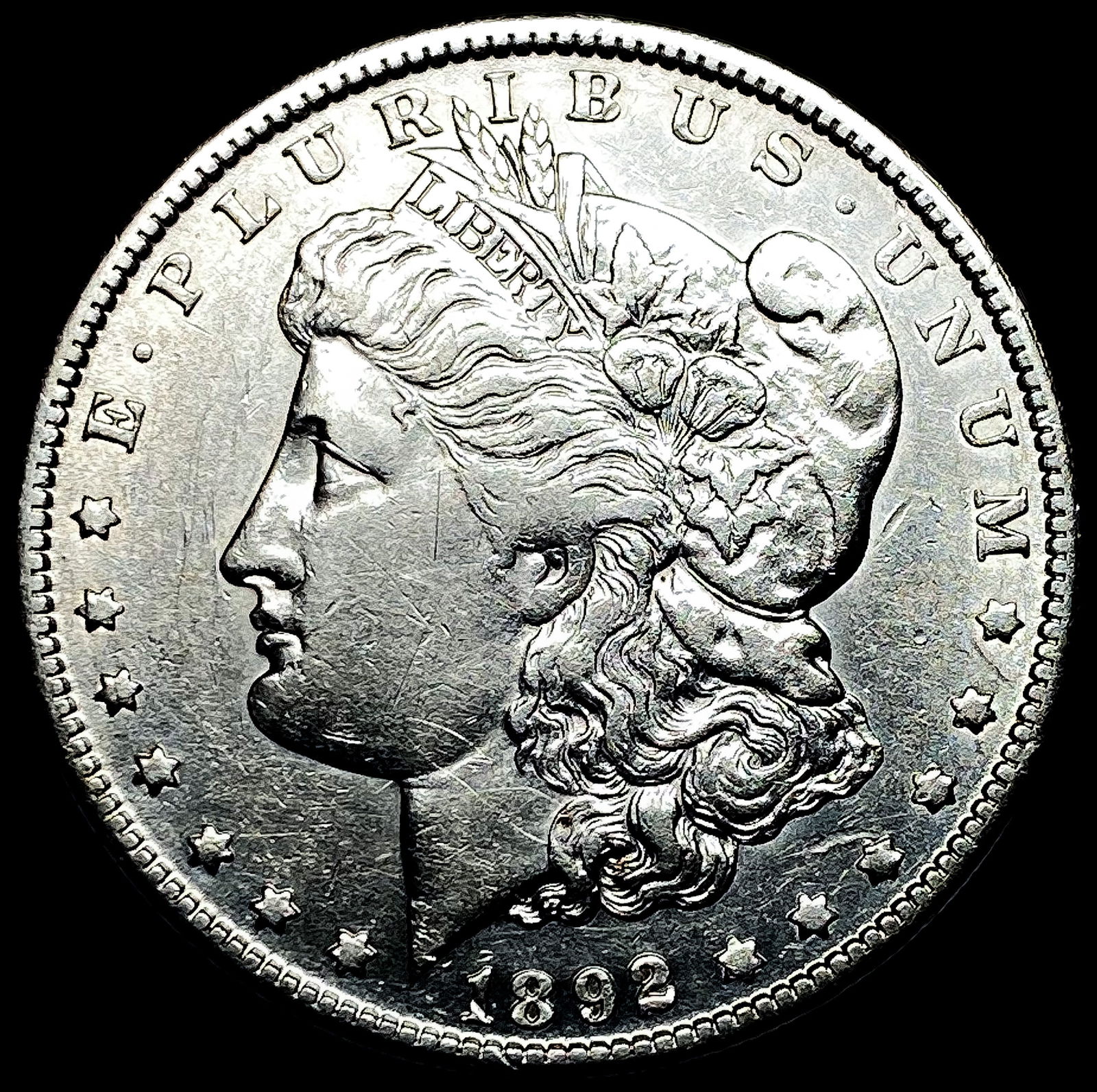 1892-O Silver Morgan Dollar NEARLY UNCIRCULATED (1 of 2)