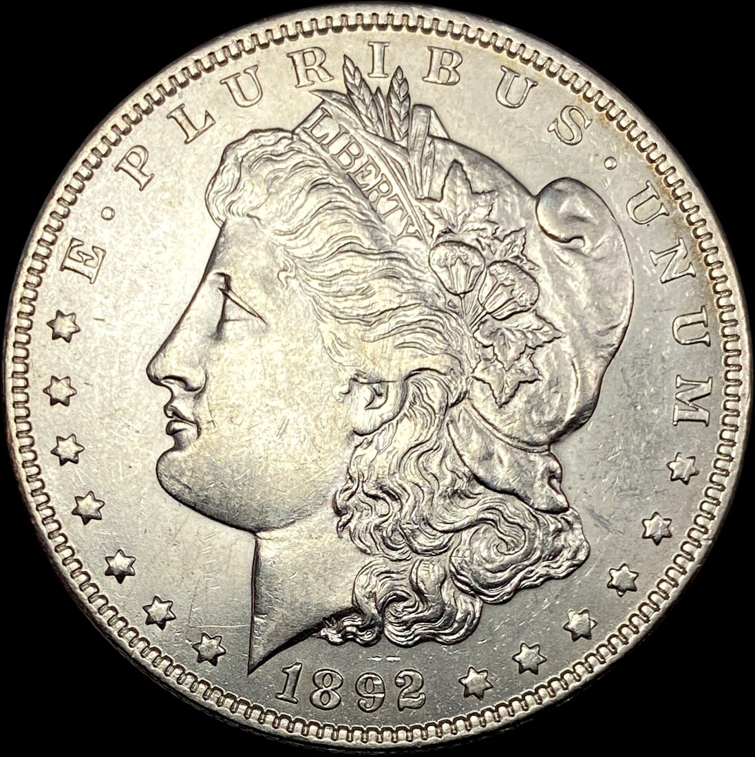 1892-O Silver Morgan Dollar CLOSELY  UNCIRCULATED (1 of 2)