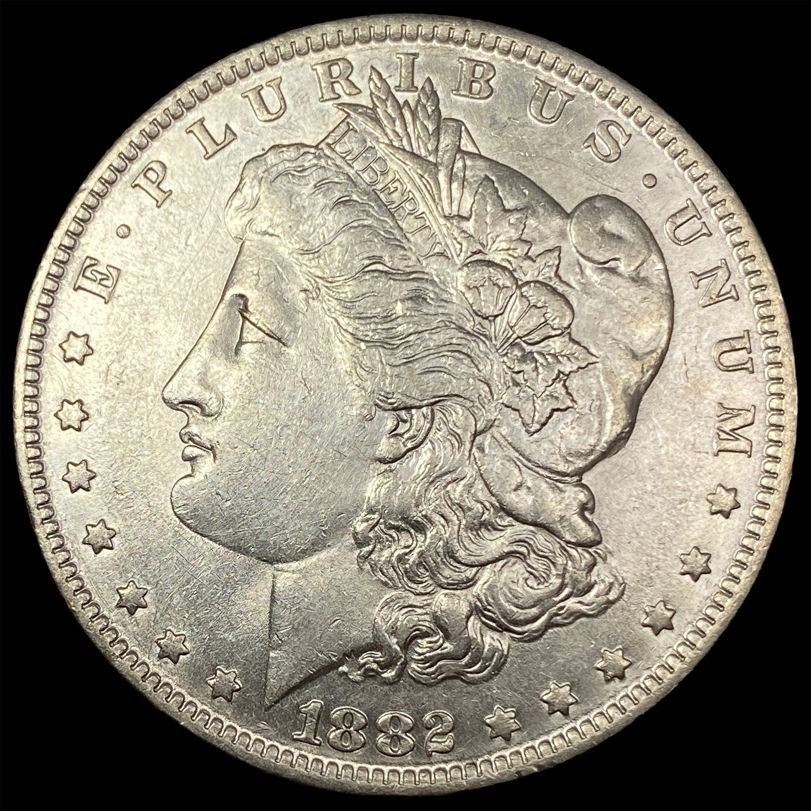 1882-O Silver Morgan Dollar CLOSELY  UNCIRCULATED (1 of 2)