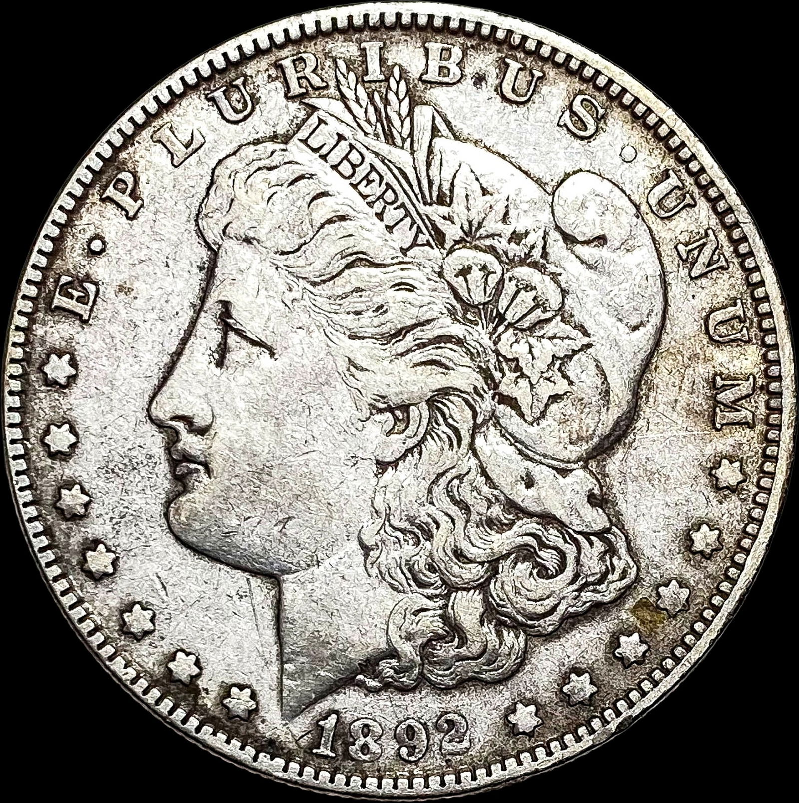 1892-O Morgan Silver Dollar NEARLY  UNCIRCULATED (1 of 2)