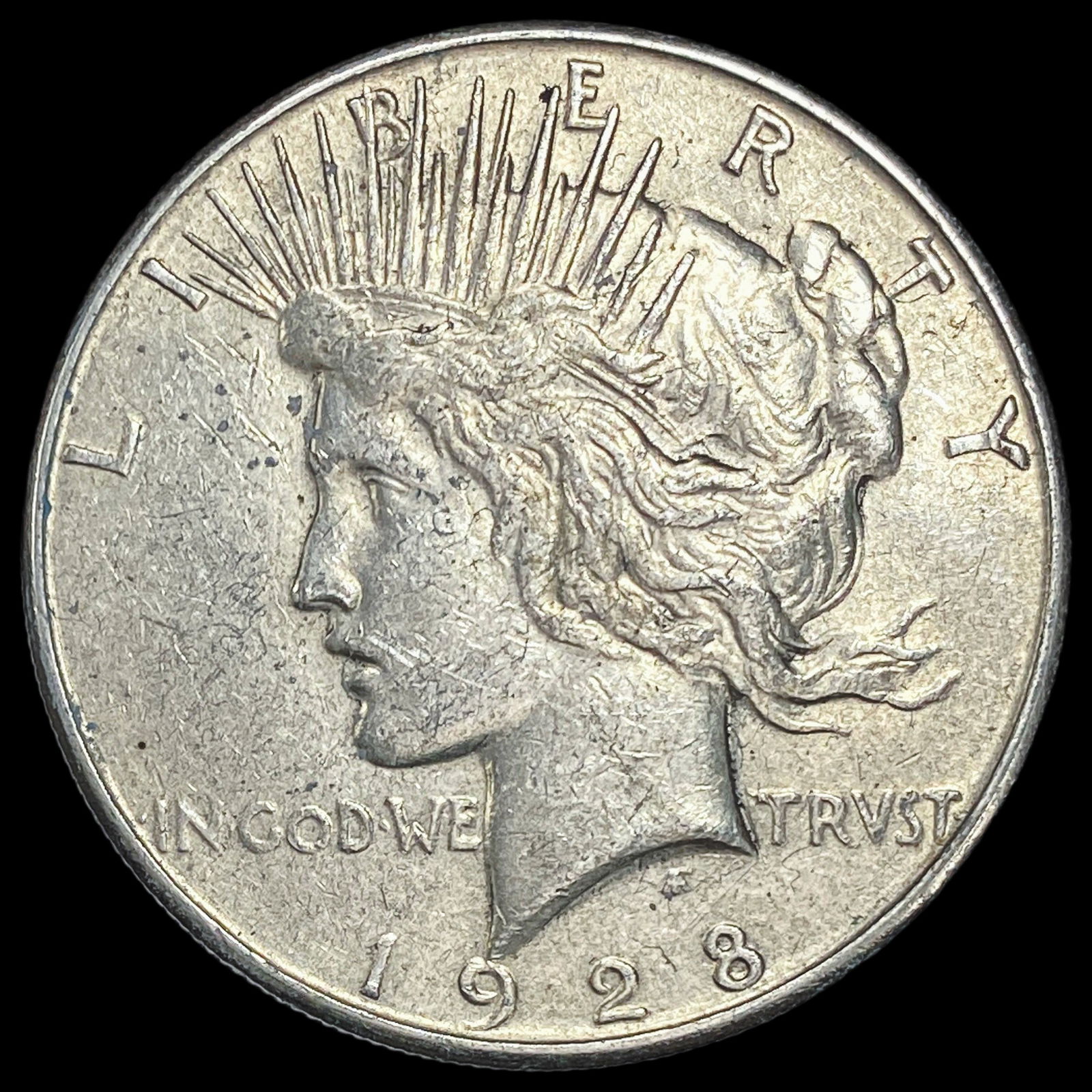 1928-S Silver Peace Dollar NEARLY UNCIRCULATED (1 of 2)