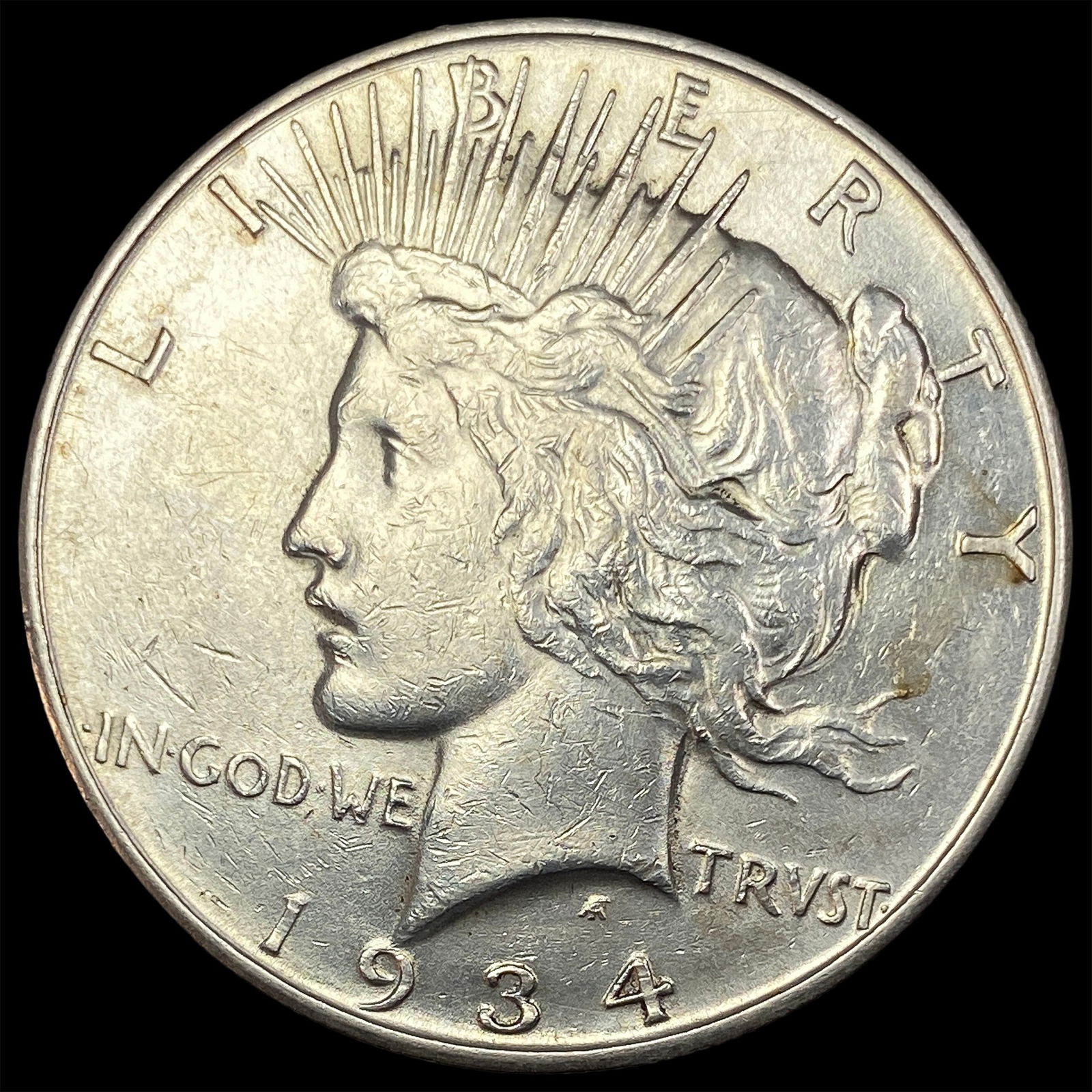 1934-D Silver Peace Dollar CLOSELY  UNCIRCULATED (1 of 2)
