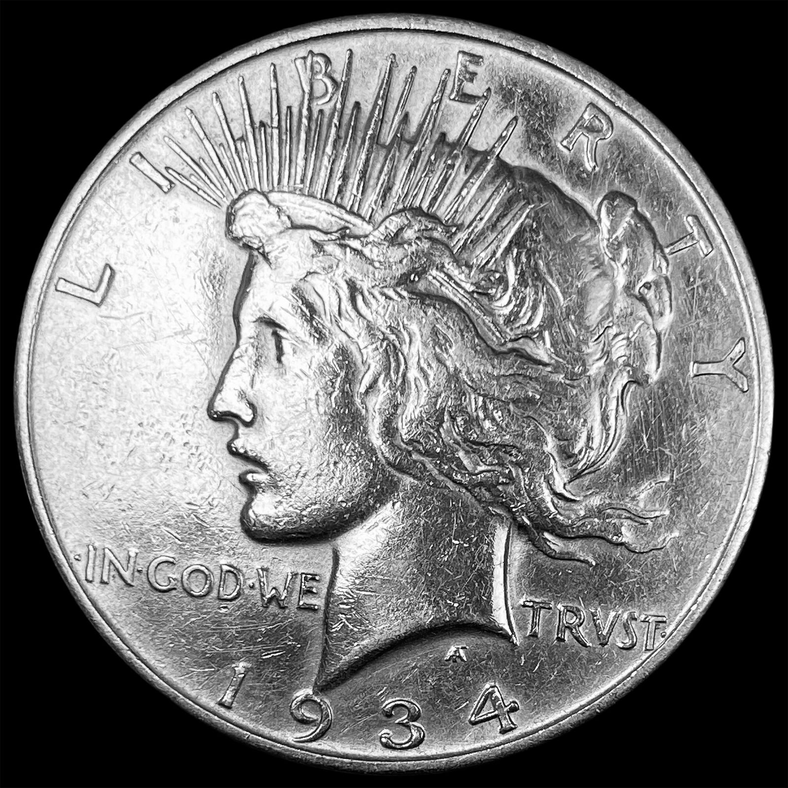 1934-D Silver Peace Dollar CLOSELY  UNCIRCULATED (1 of 2)