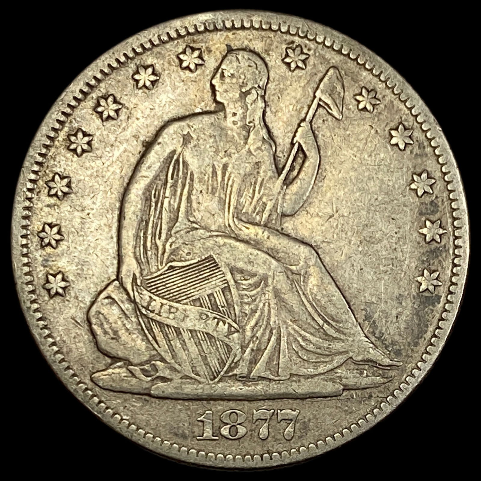 1877 Seated Liberty Half Dollar ABOUT UNCIRCULATED (1 of 2)