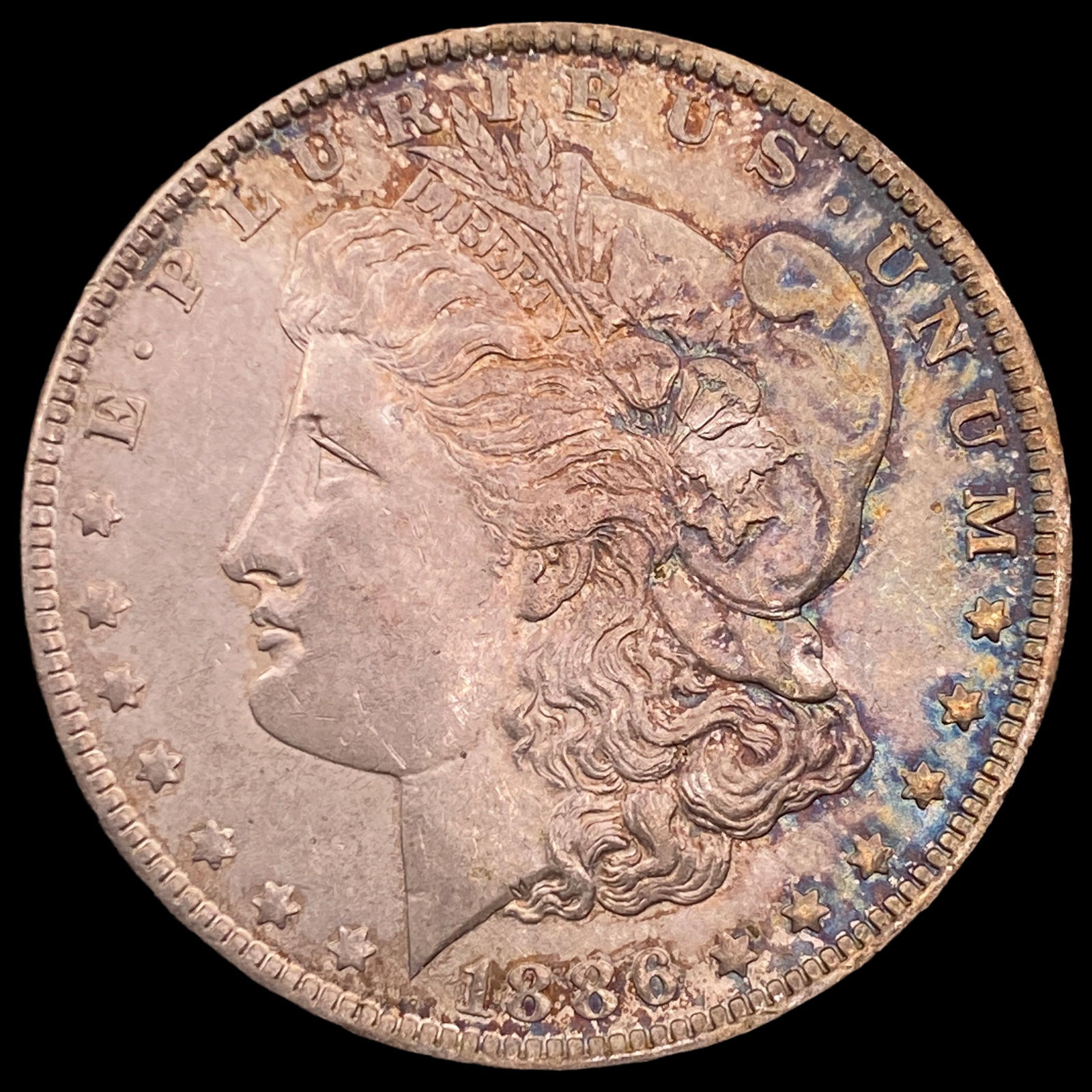 1886-O Silver Morgan Dollar CLOSELY  UNCIRCULATED (1 of 2)