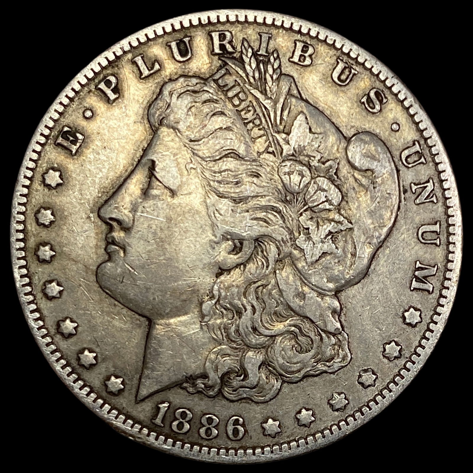 1886-O Silver Morgan Dollar NEARLY  UNCIRCULATED (1 of 2)