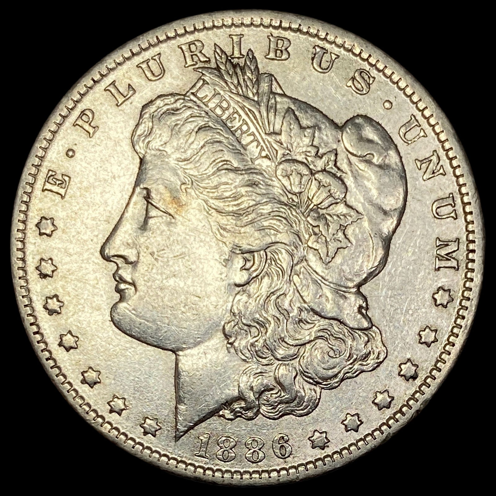 1886-O Silver Morgan Dollar CLOSELY  UNCIRCULATED (1 of 2)