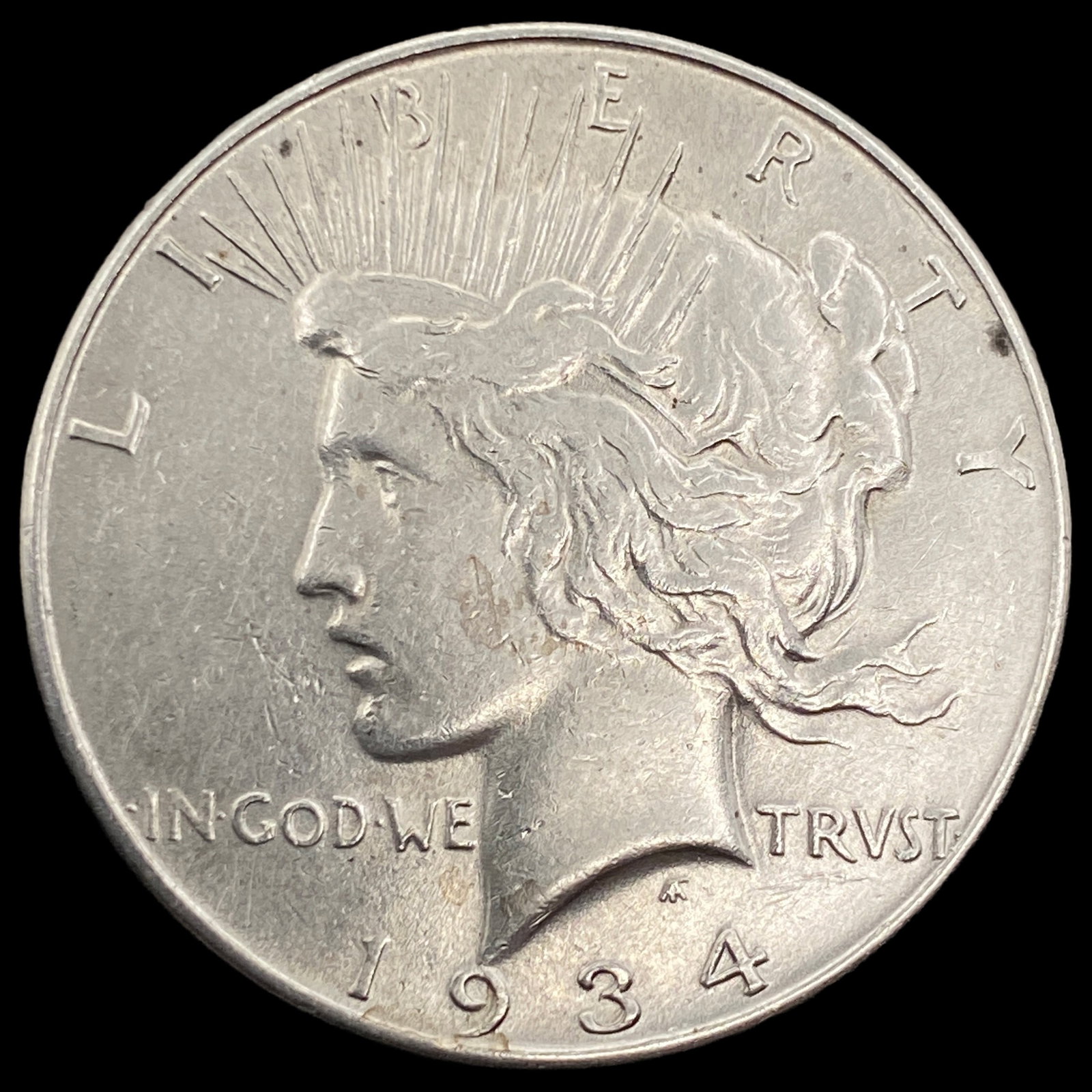 1934 Peace Silver Dollar CLOSELY UNCIRCULATED (1 of 2)