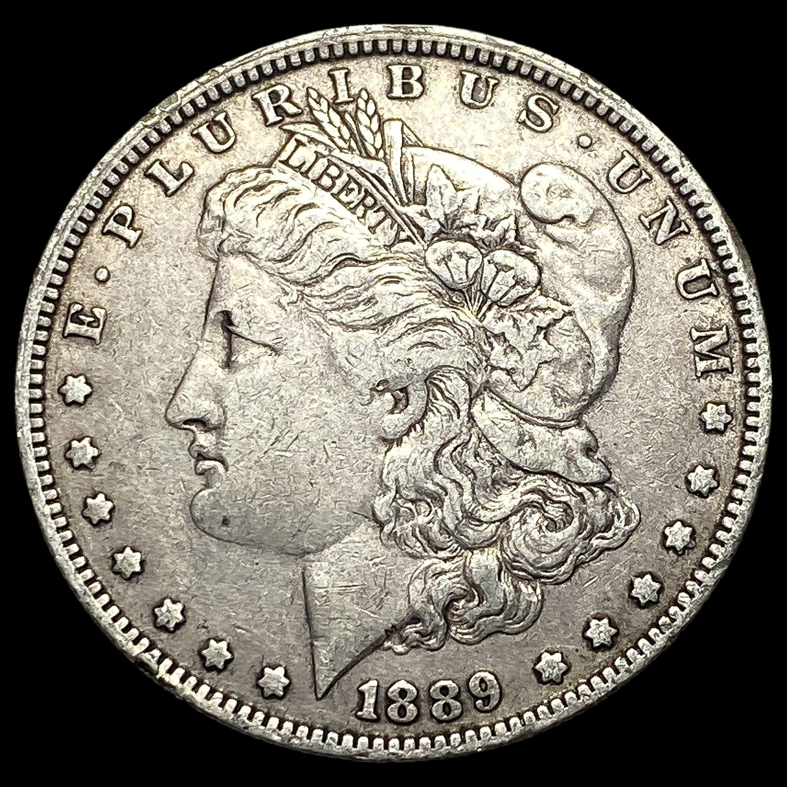 1889-O Silver Morgan Dollar NEARLY UNCIRCULATED (1 of 2)