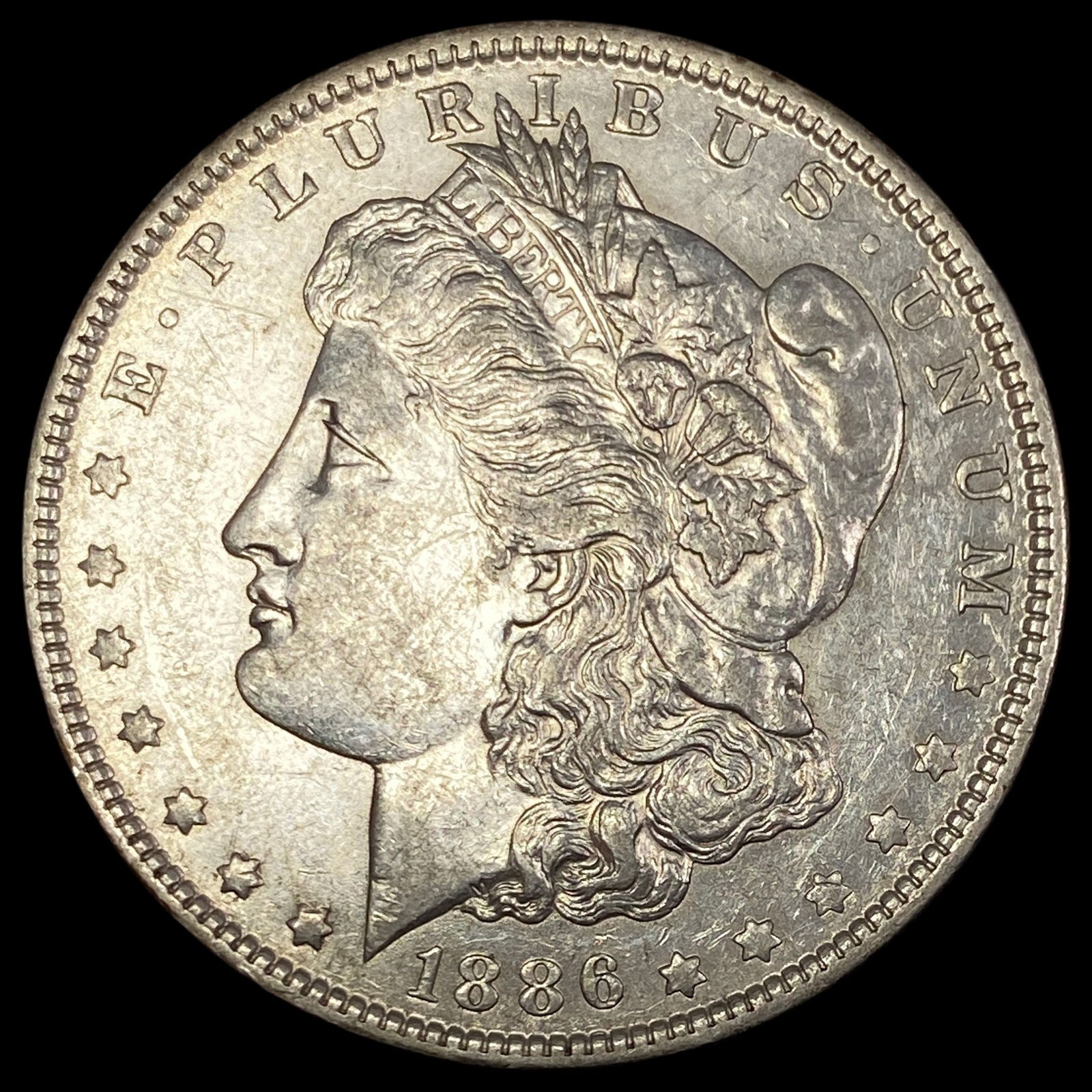 1886-O Morgan Silver Dollar CLOSELY UNCIRCULATED (1 of 2)