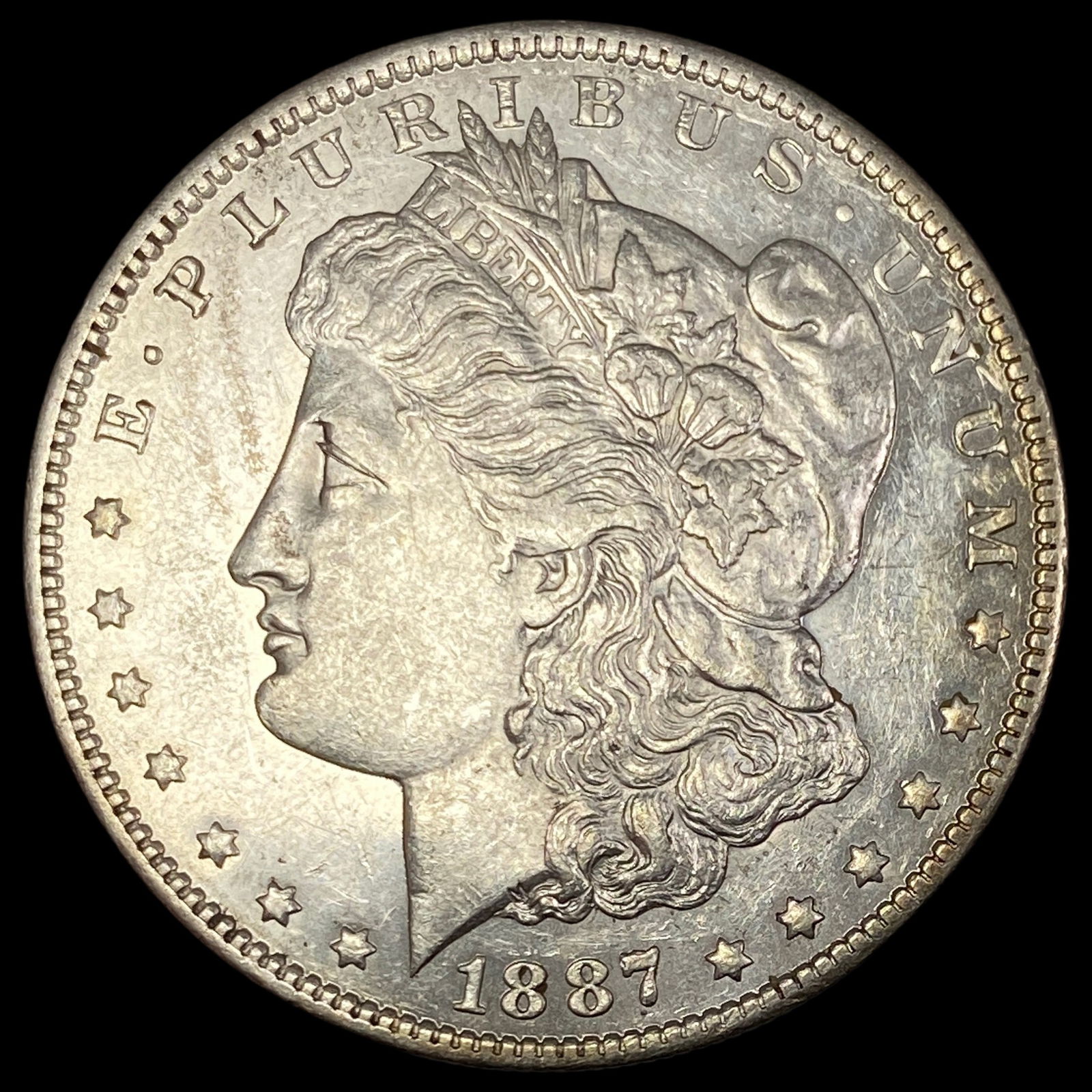 1887-O Silver Morgan Dollar CLOSELY UNCIRCULATED (1 of 2)