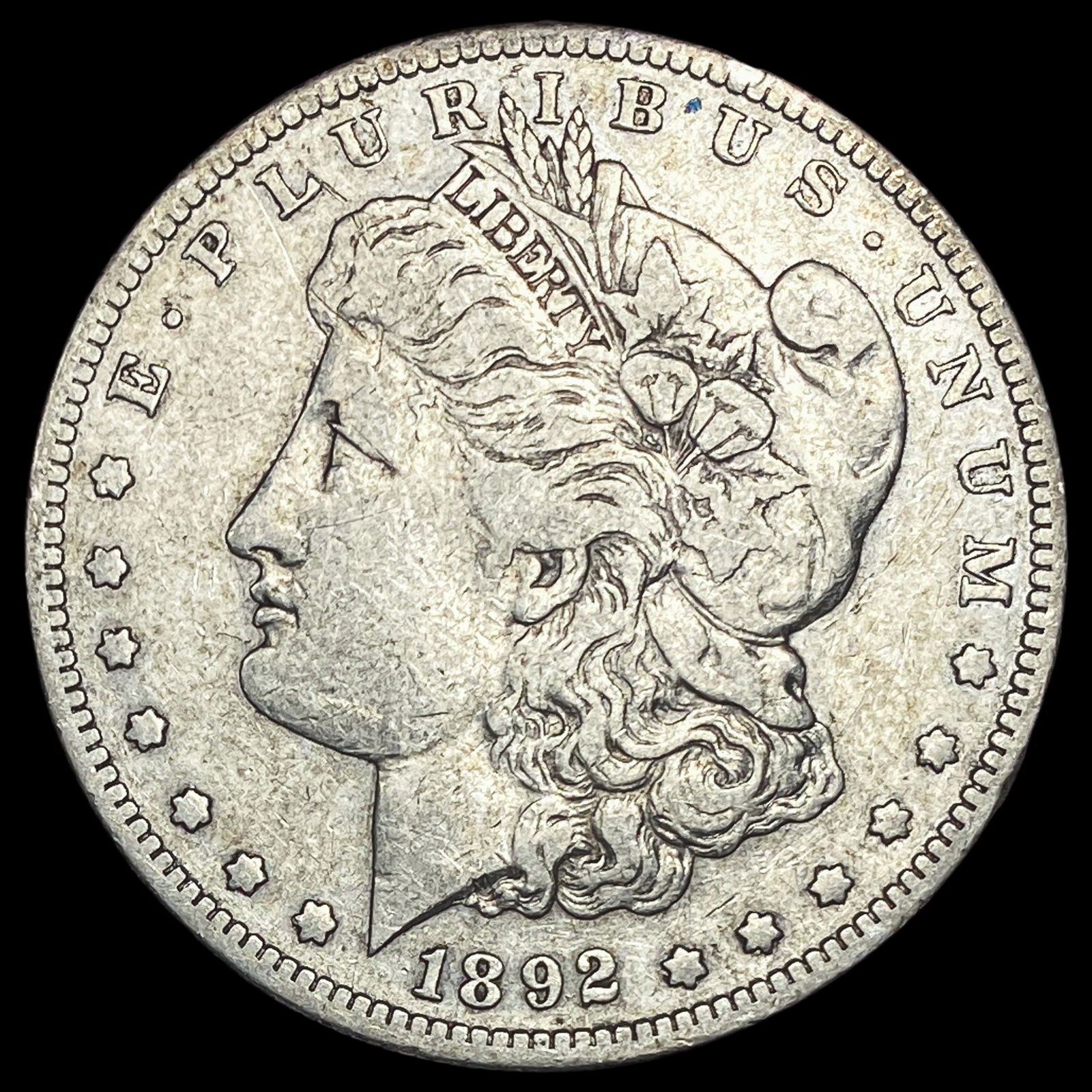 1892-S Silver Morgan Dollar NEARLY  UNCIRCULATED (1 of 2)