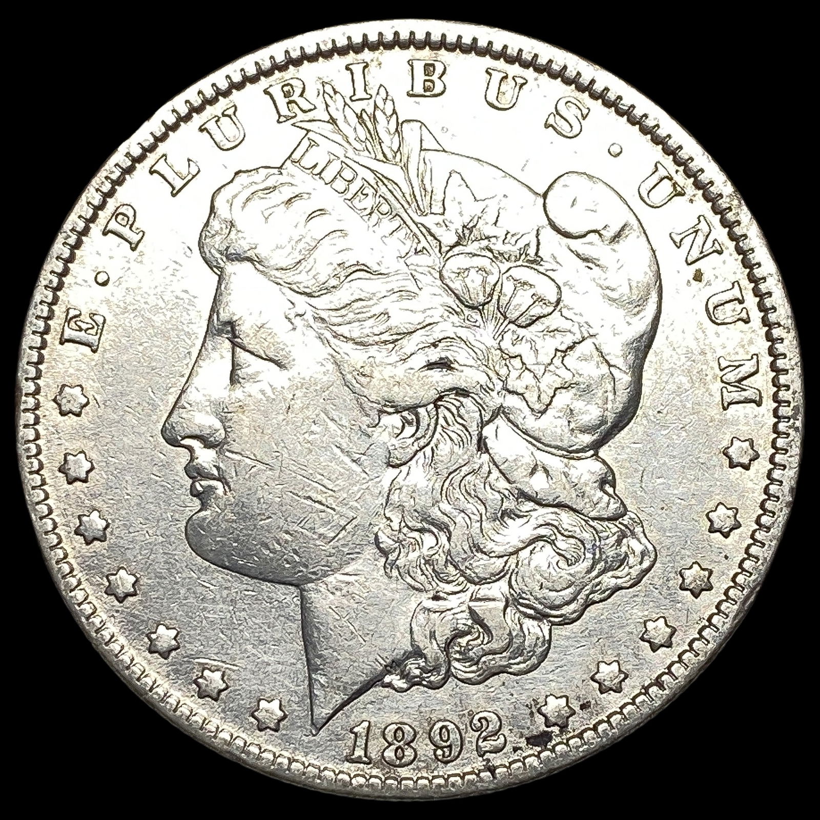1892-O Silver Morgan Dollar NEARLY UNCIRCULATED (1 of 2)