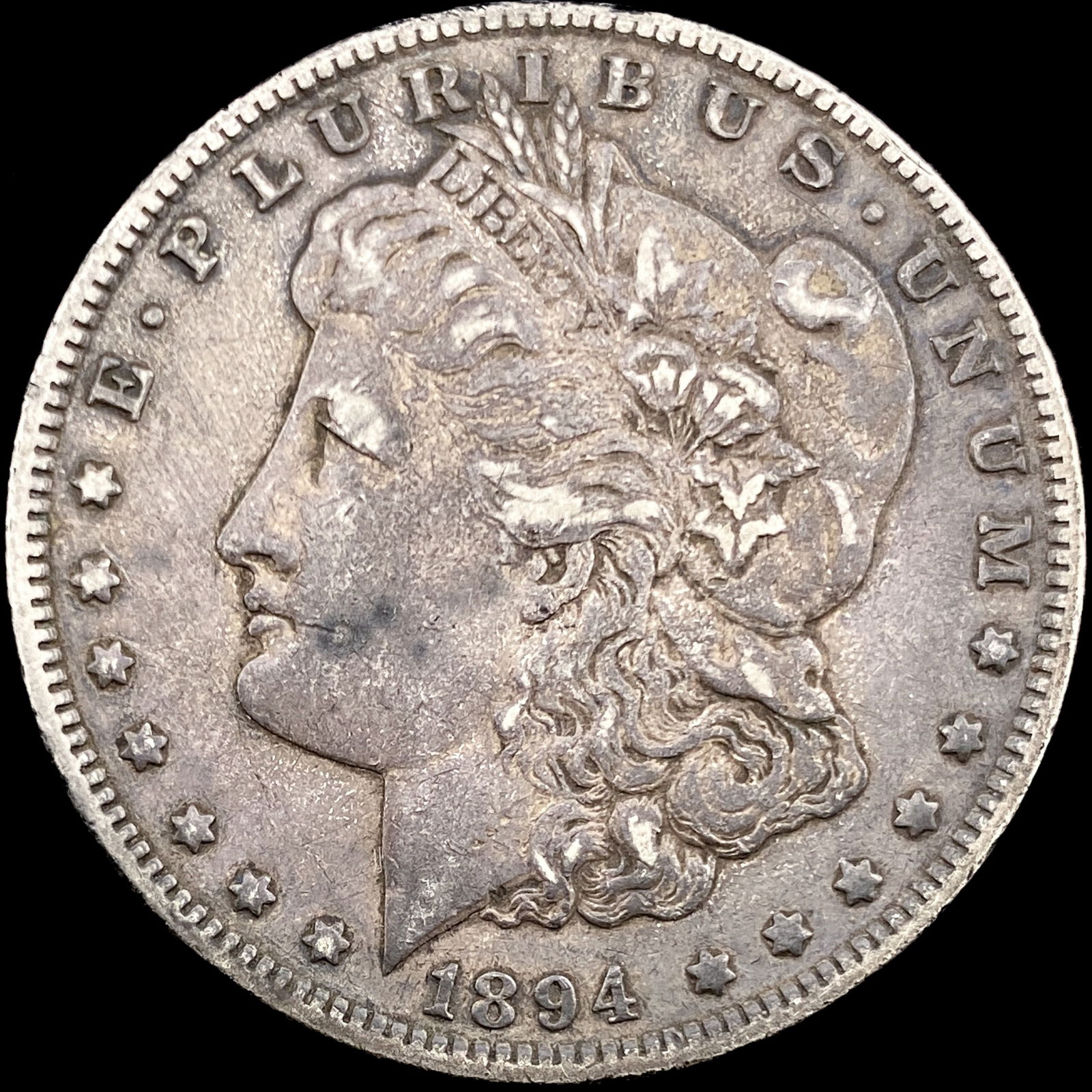 1894-O Silver Morgan Dollar NEARLY UNCIRCULATED (1 of 2)
