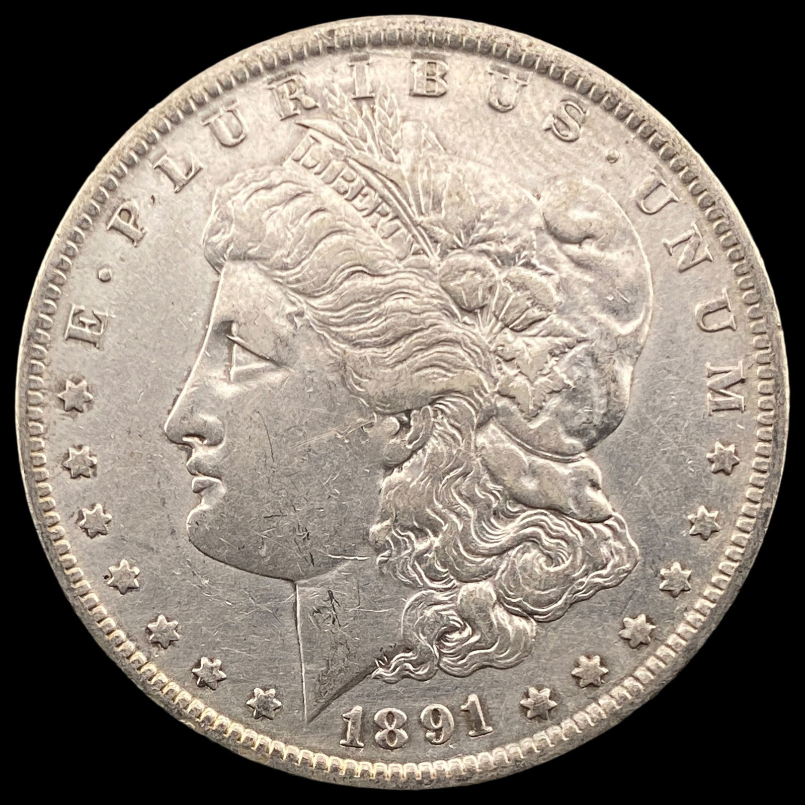 1891-O Silver Morgan Dollar CLOSELY UNCIRCULATED (1 of 2)