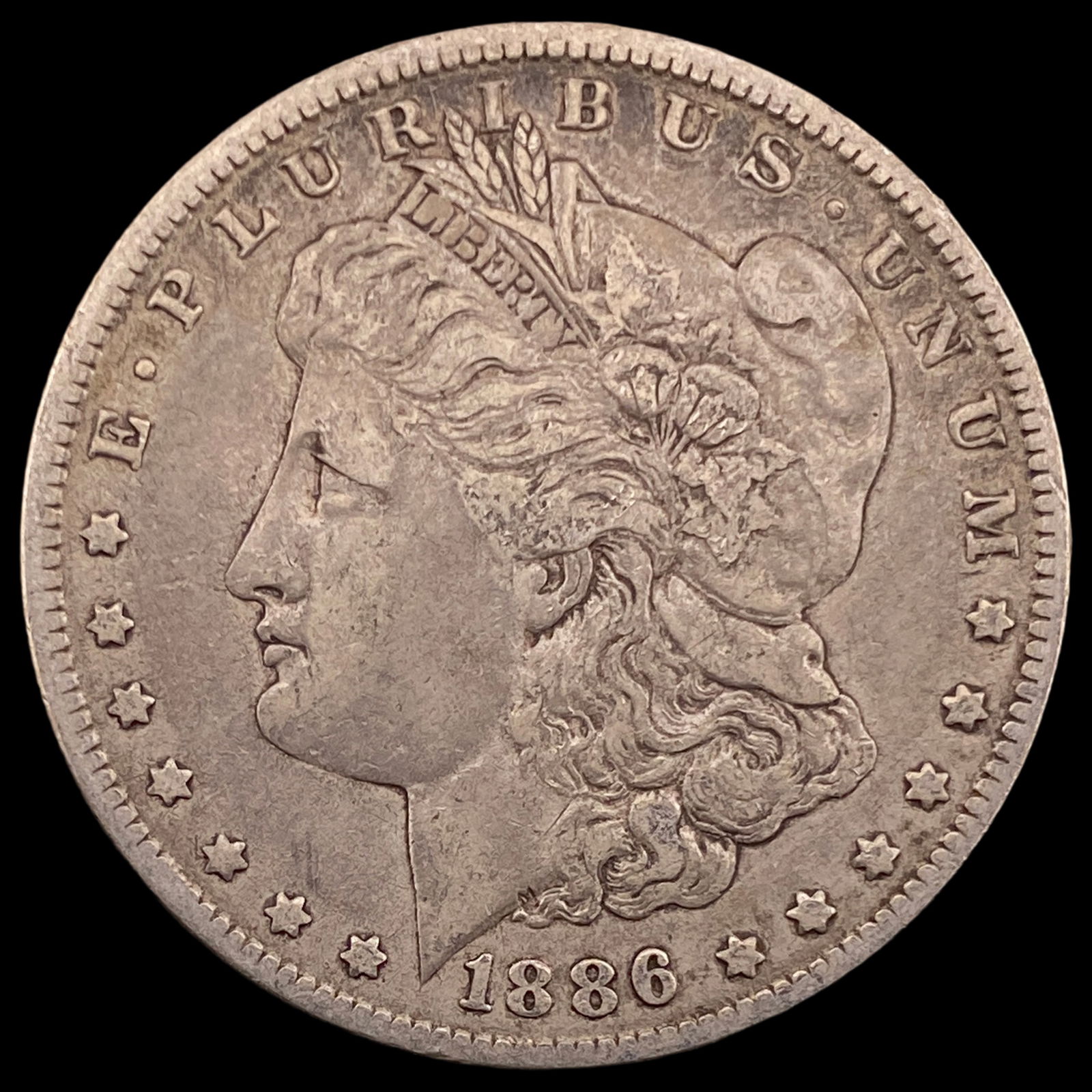1886-O Silver Morgan Dollar ABOUT UNCIRCULATED (1 of 2)