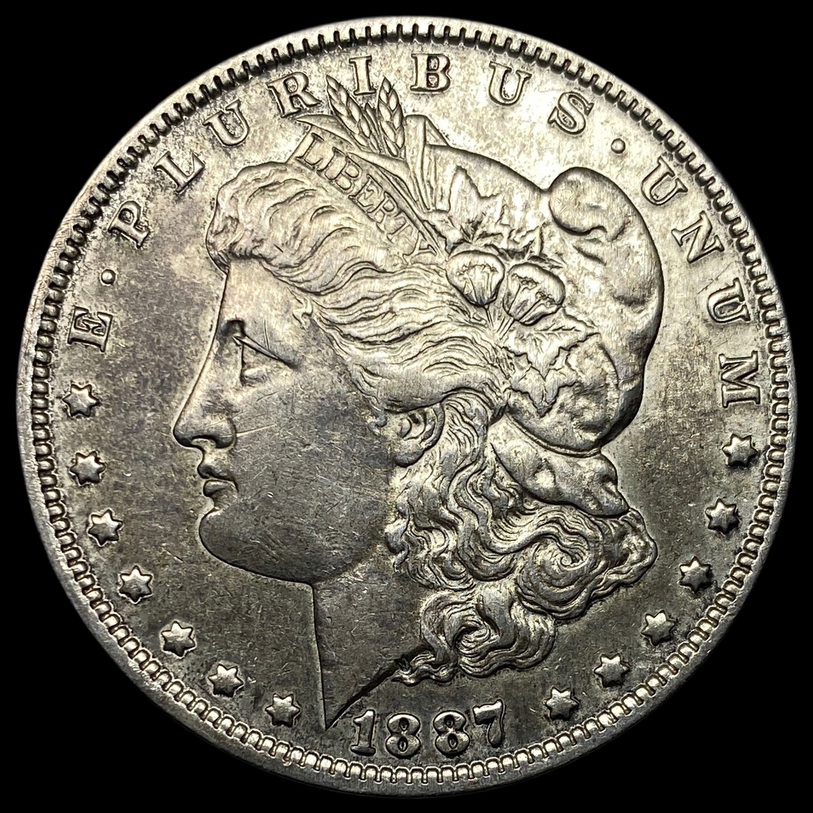 1887-O Silver Morgan Dollar CLOSELY UNCIRCULATED (1 of 2)