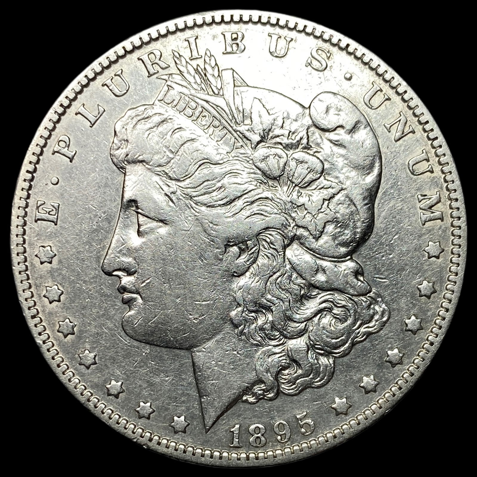 1895-O Silver Morgan Dollar NEARLY UNCIRCULATED (1 of 2)