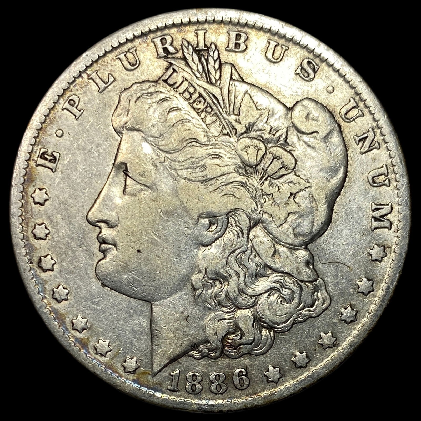 1886-O Silver Morgan Dollar LIGHTLY CIRCULATED (1 of 2)