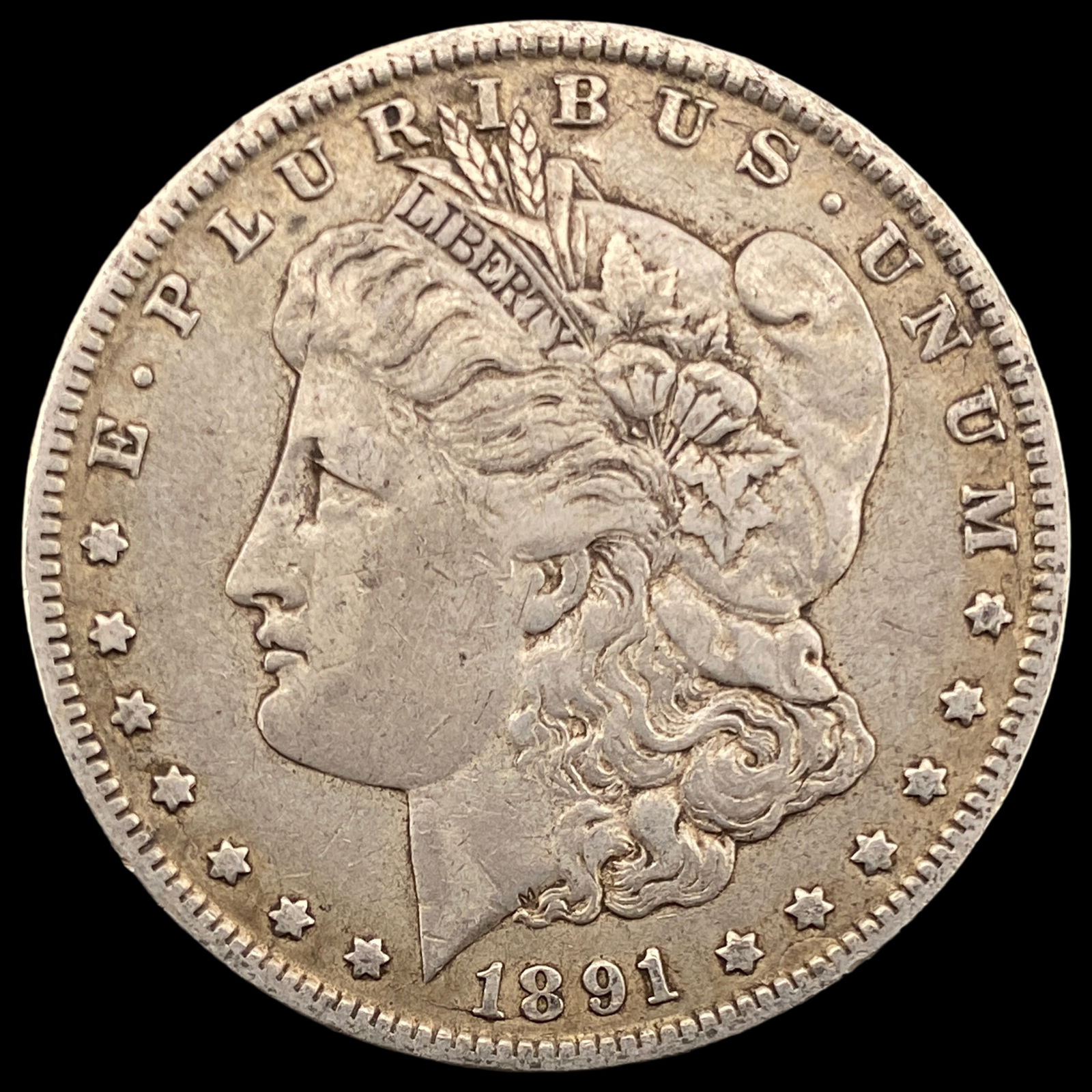 1891-O Silver Morgan Dollar NEARLY UNCIRCULATED (1 of 2)