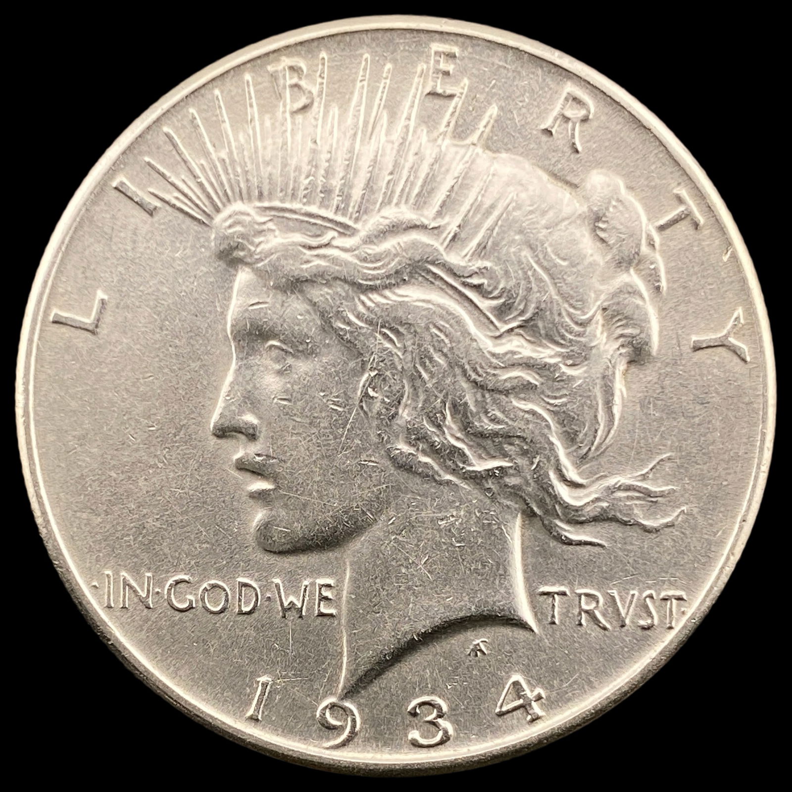 1934 Peace Silver Dollar CLOSELY UNCIRCULATED (1 of 2)