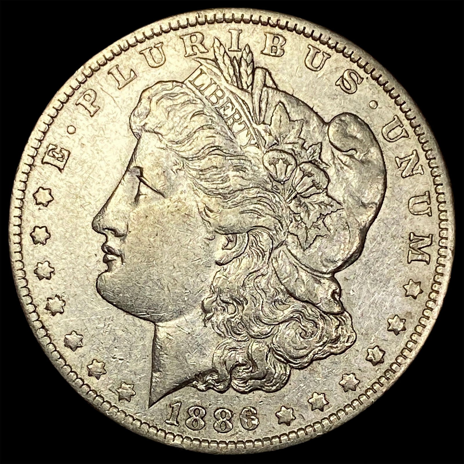 1886-O Morgan Silver Dollar NEARLY  UNCIRCULATED (1 of 2)
