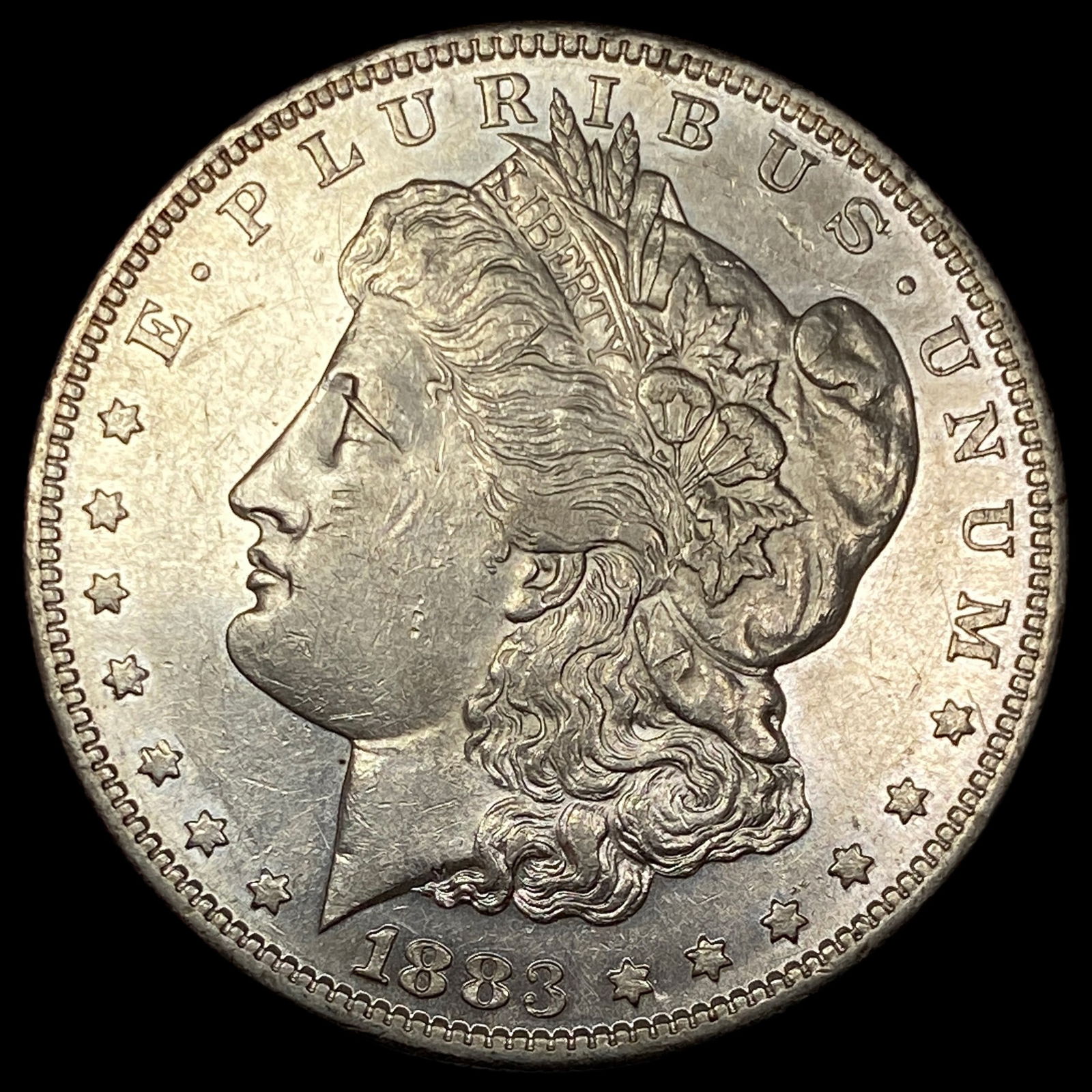 1883-S Silver Morgan Dollar CLOSELY  UNCIRCULATED (1 of 2)