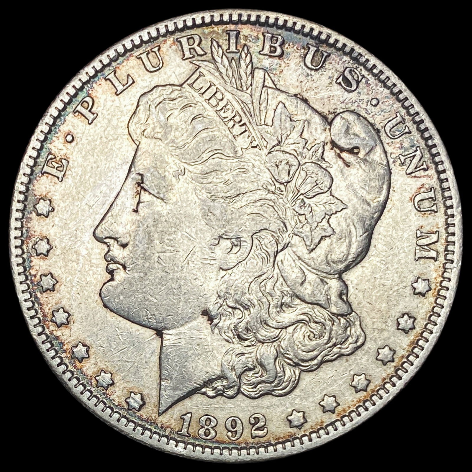 1892-O Silver Morgan Dollar NEARLY  UNCIRCULATED (1 of 2)