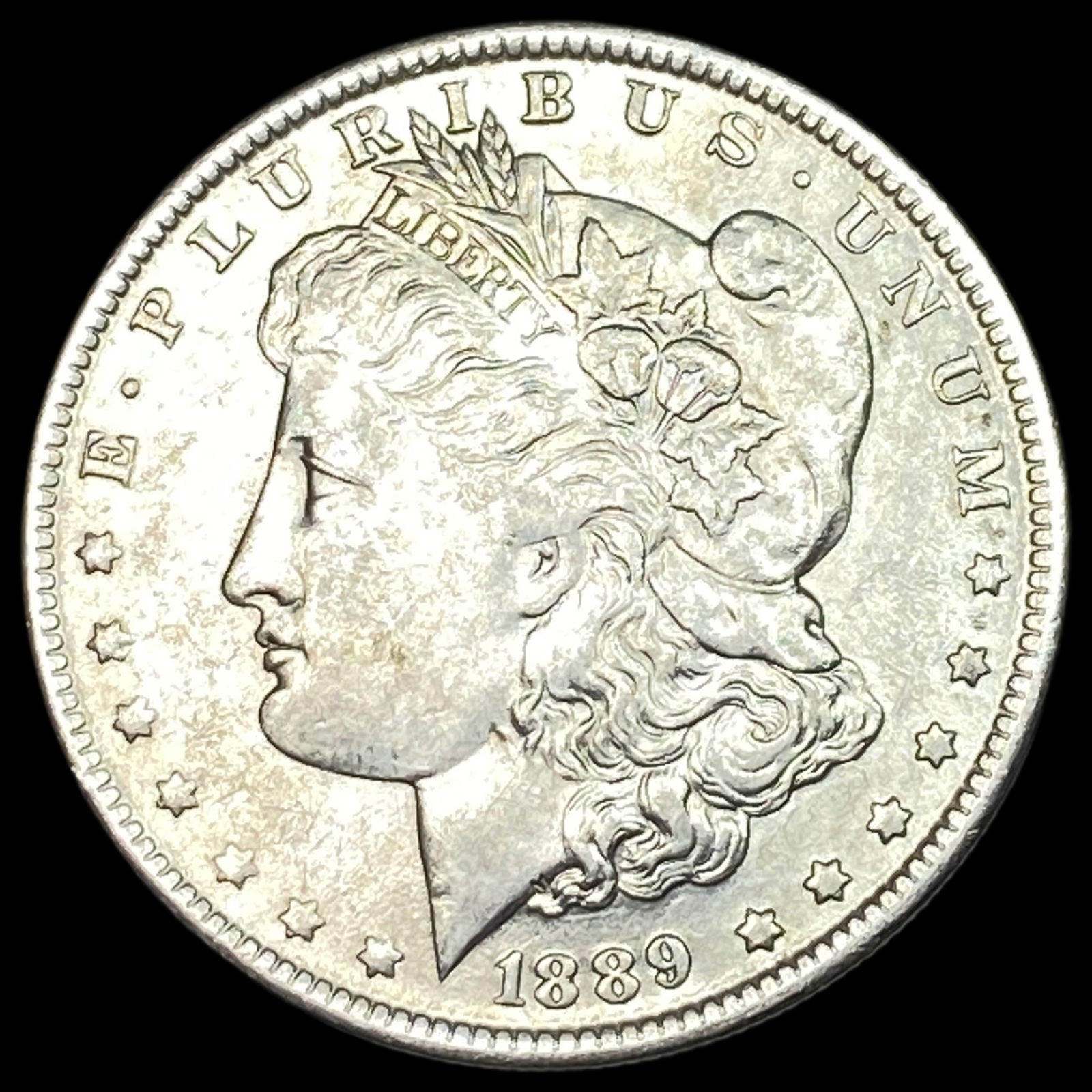1889-O Silver Morgan Dollar CLOSELY  UNCIRCULATED (1 of 2)