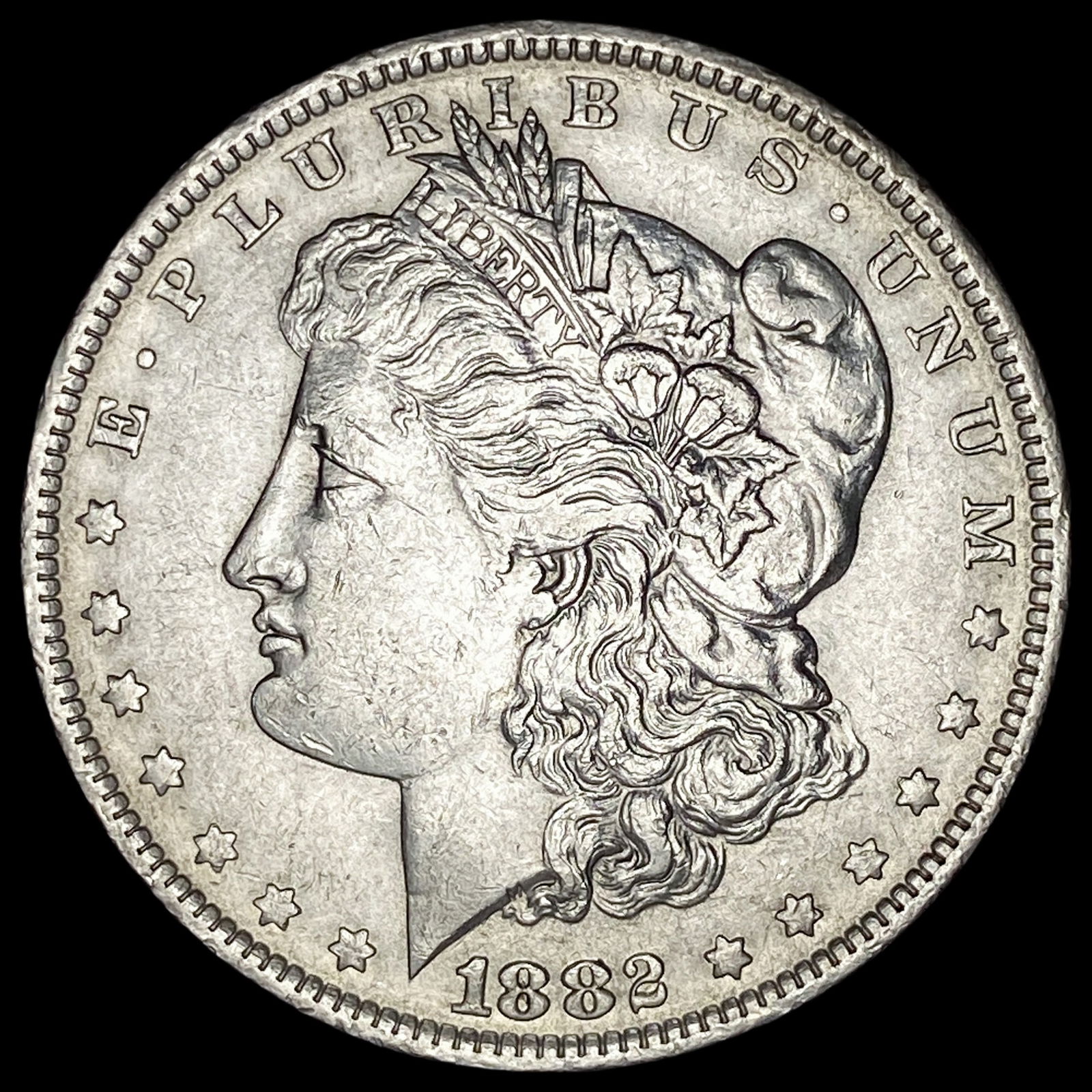 1882-O Morgan Silver Dollar CLOSELY  UNCIRCULATED (1 of 2)