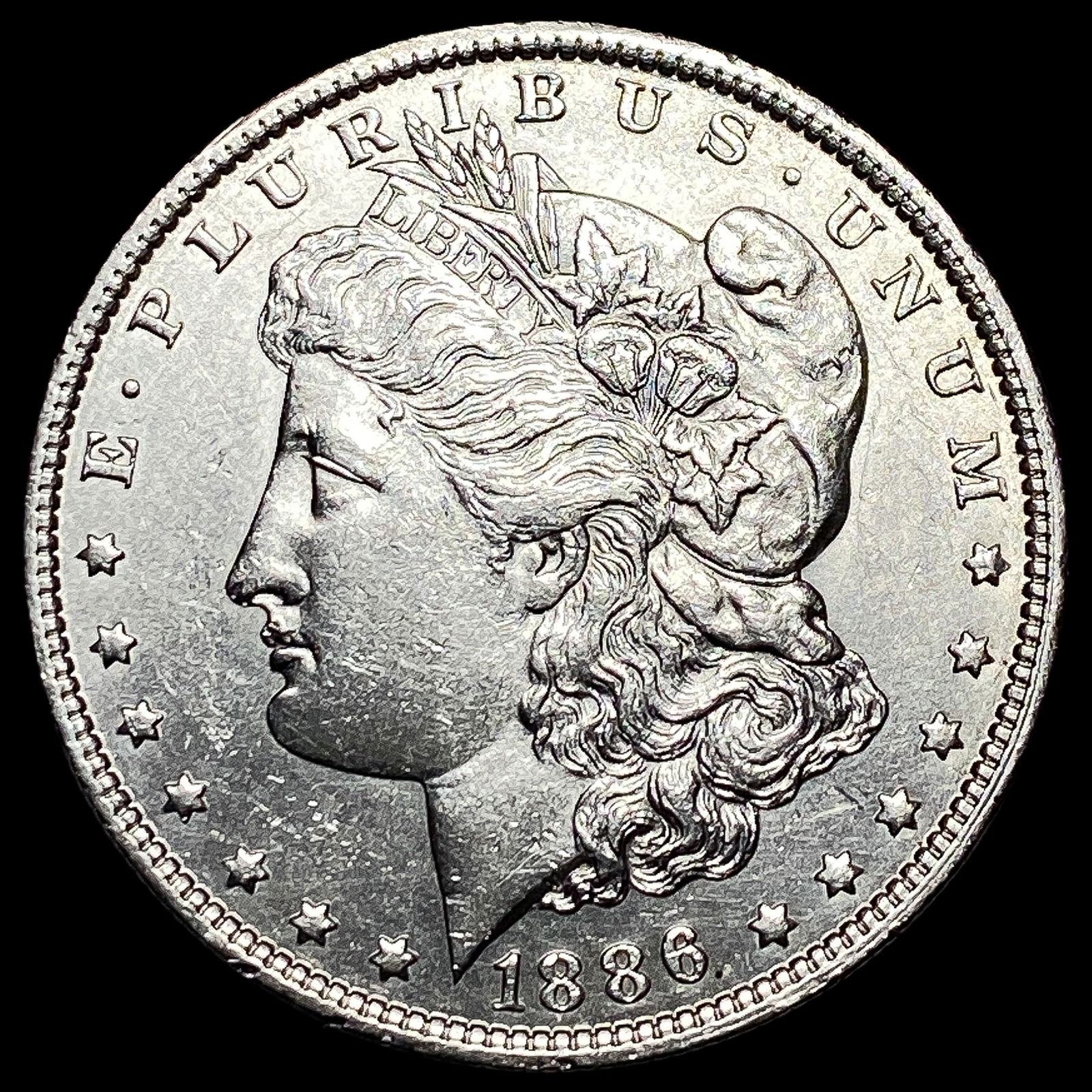 1886-O Silver Morgan Dollar CLOSELY UNCIRCULATED (1 of 2)