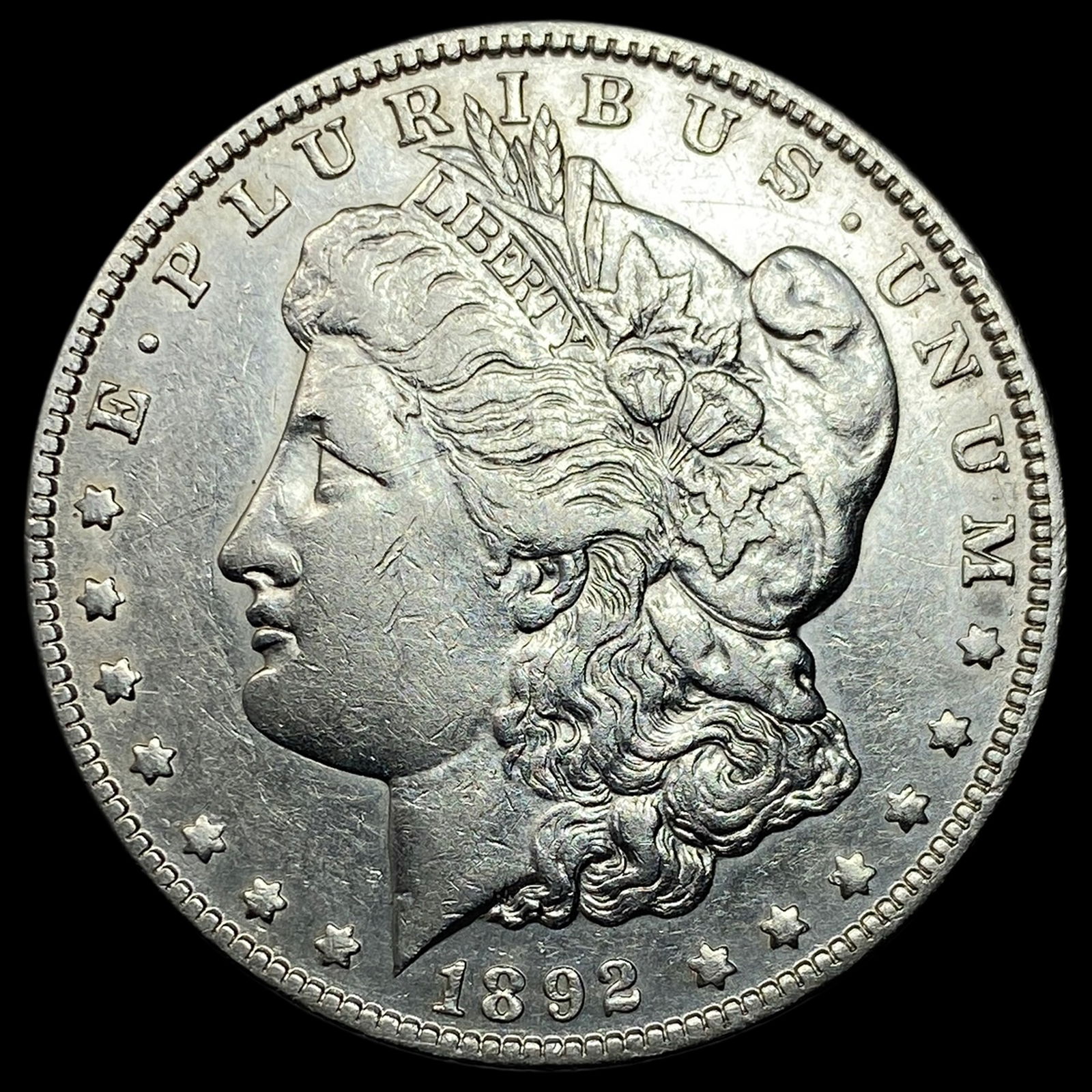1892-O Silver Morgan Dollar NEARLY UNCIRCULATED (1 of 2)