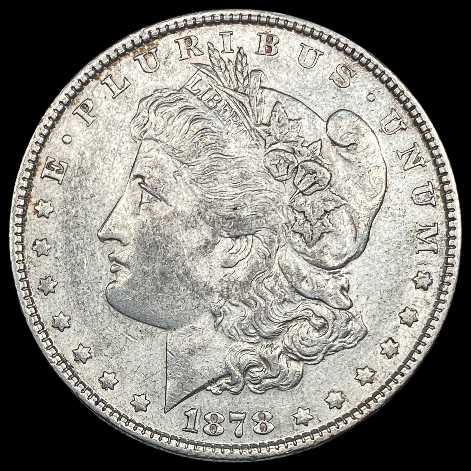 1878 Silver Morgan Dollar CLOSELY UNCIRCULATED (1 of 2)