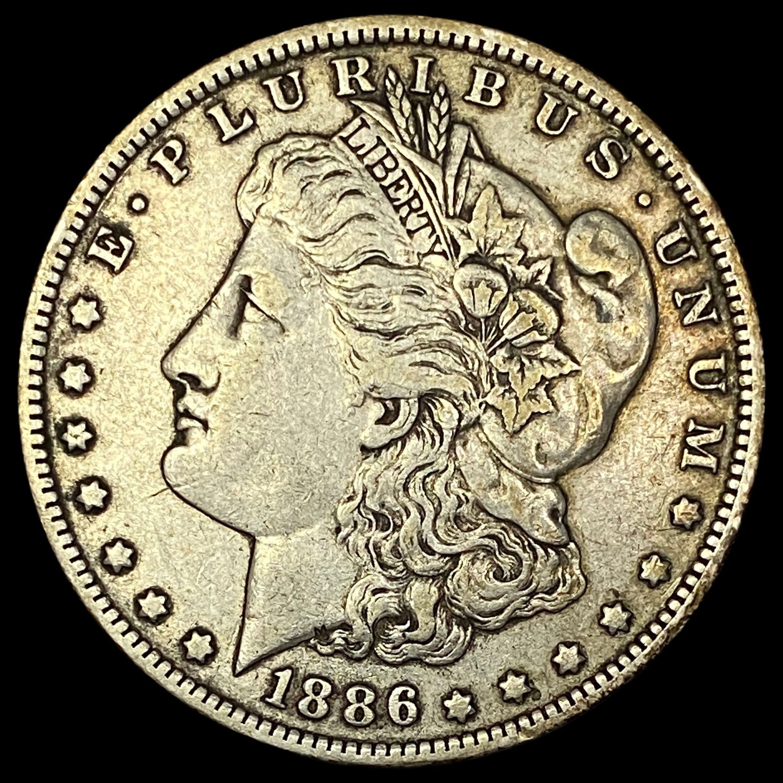 1886-O Silver Morgan Dollar NEARLY UNCIRCULATED (1 of 2)