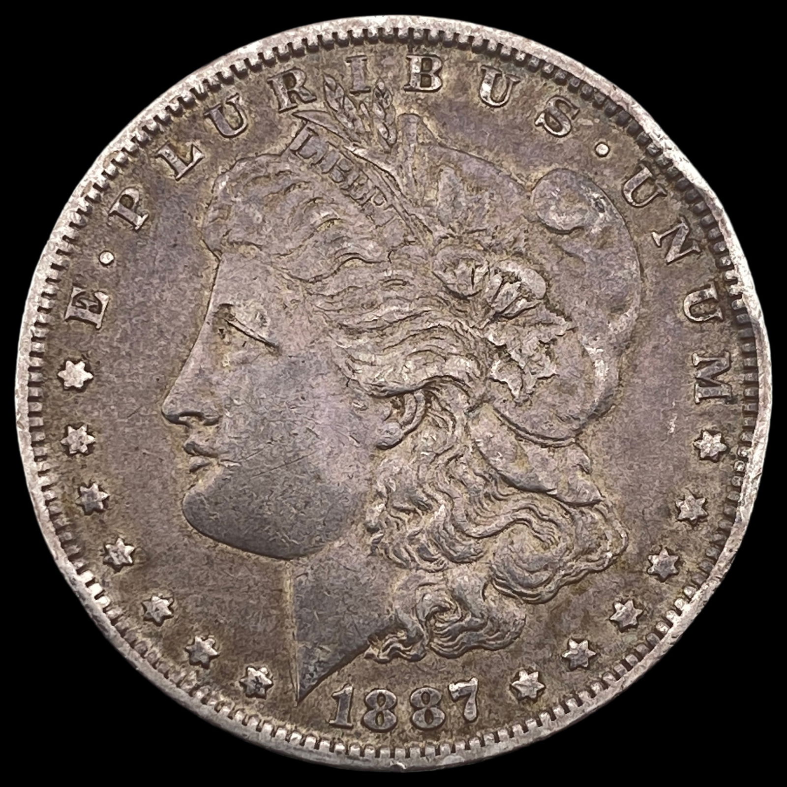 1887-O Silver Morgan Dollar ABOUT UNCIRCULATED (1 of 2)