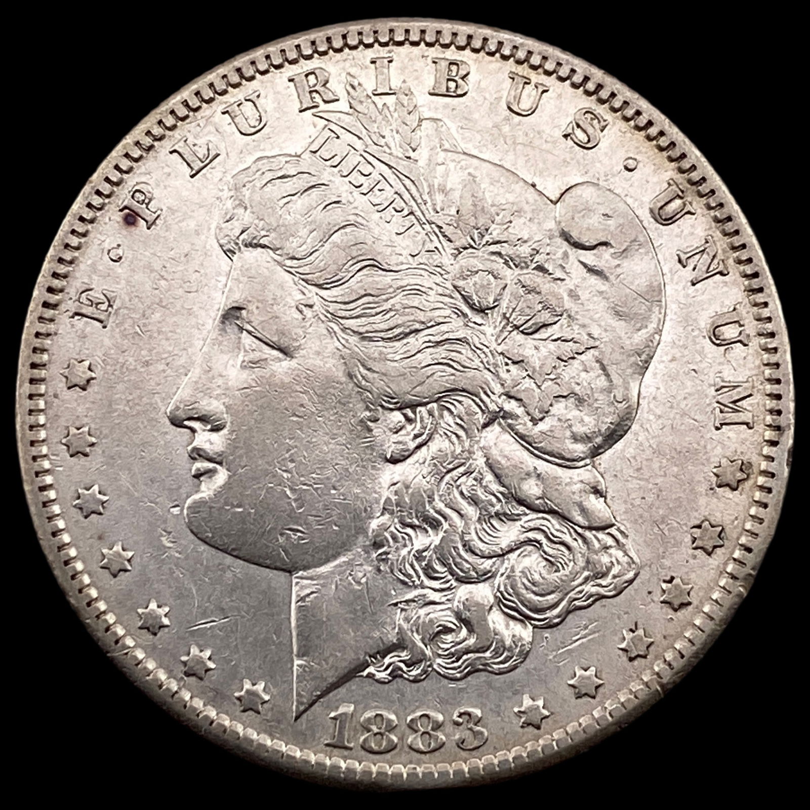 1883-S Silver Morgan Dollar CLOSELY UNCIRCULATED (1 of 2)