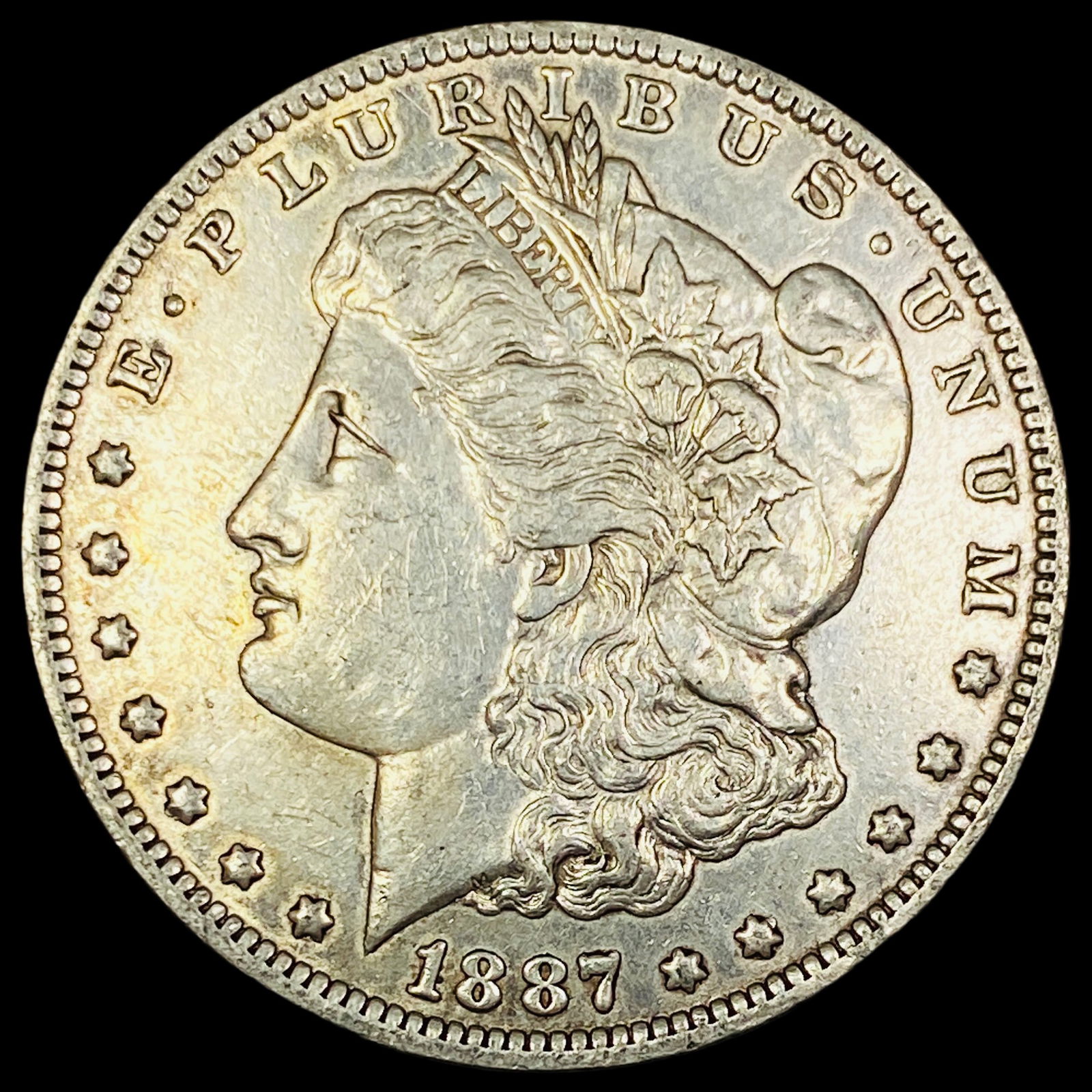 1887-O Silver Morgan Dollar CLOSELY UNCIRCULATED (1 of 2)