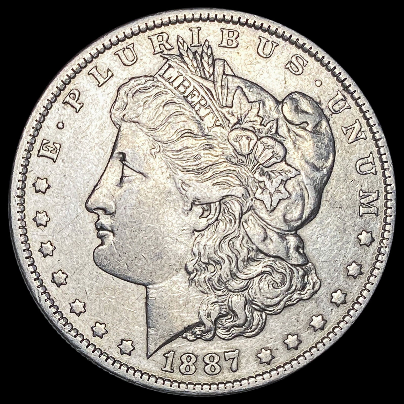 1887-O Morgan Silver Dollar NEARLY UNCIRCULATED (1 of 2)