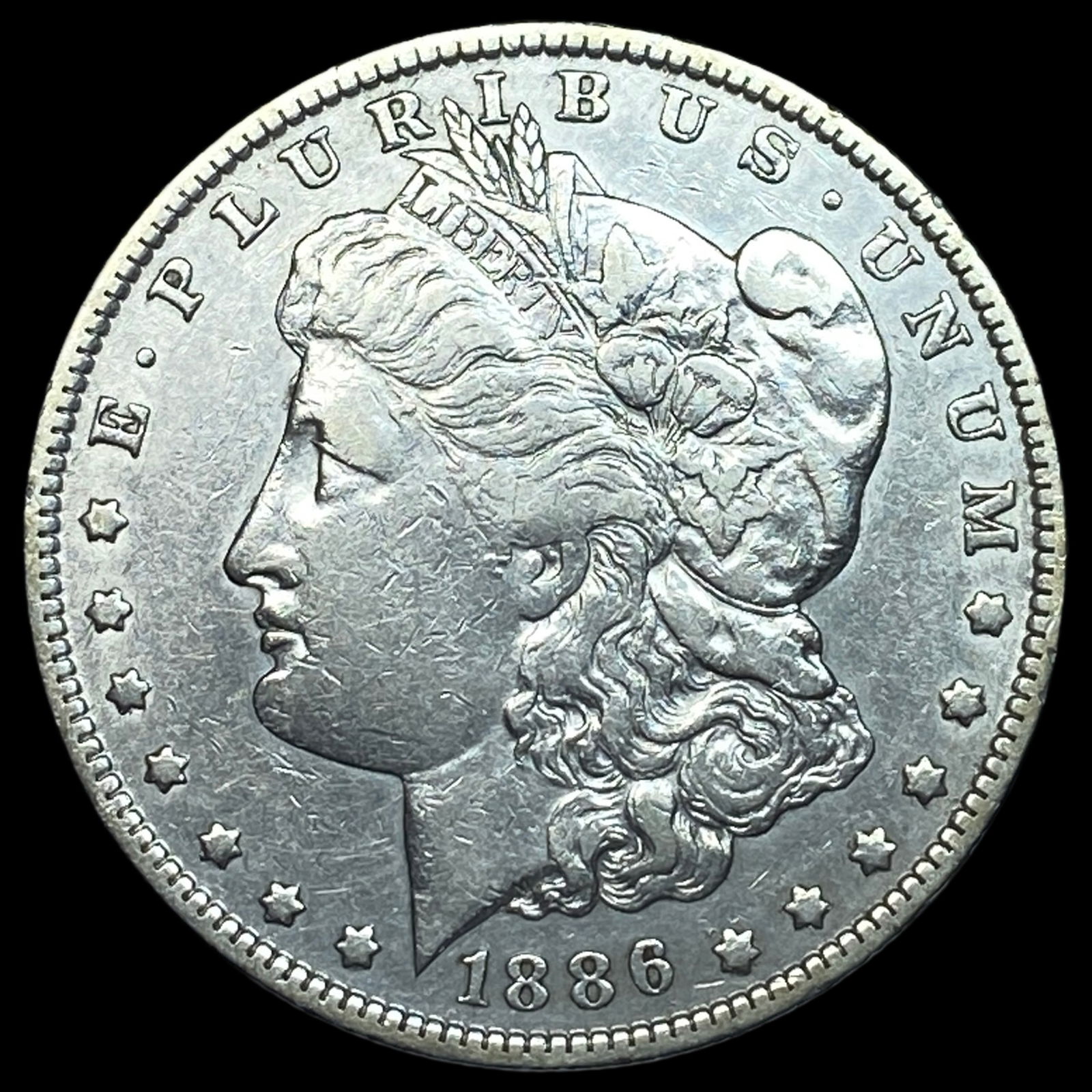1886-O Silver Morgan Dollar NEARLY UNCIRCULATED (1 of 2)