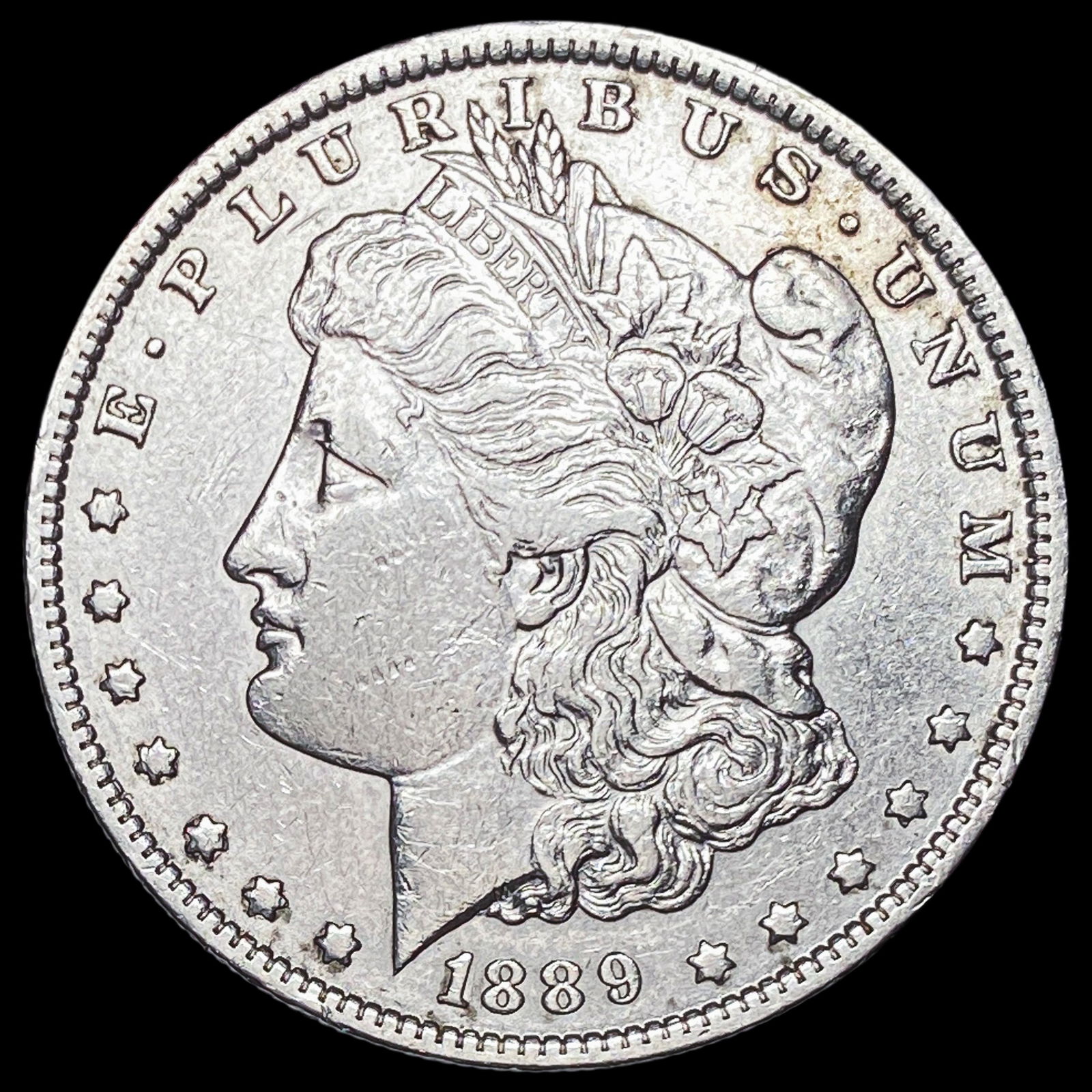 1889-O Silver Morgan Dollar CLOSELY UNCIRCULATED (1 of 2)