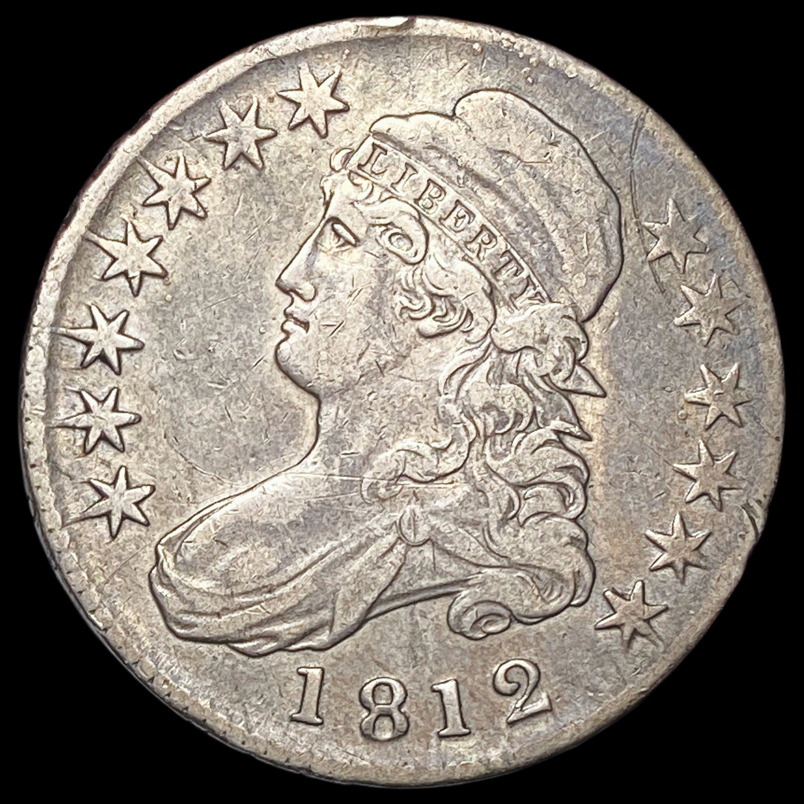 1812 Capped Bust Half Dollar NEARLY UNCIRCULATED (1 of 2)