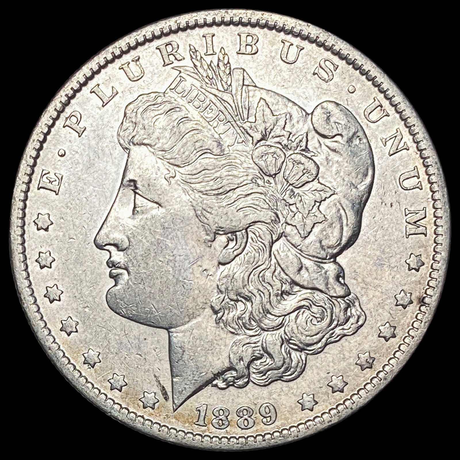 1889-O Silver Morgan Dollar CLOSELY UNCIRCULATED (1 of 2)