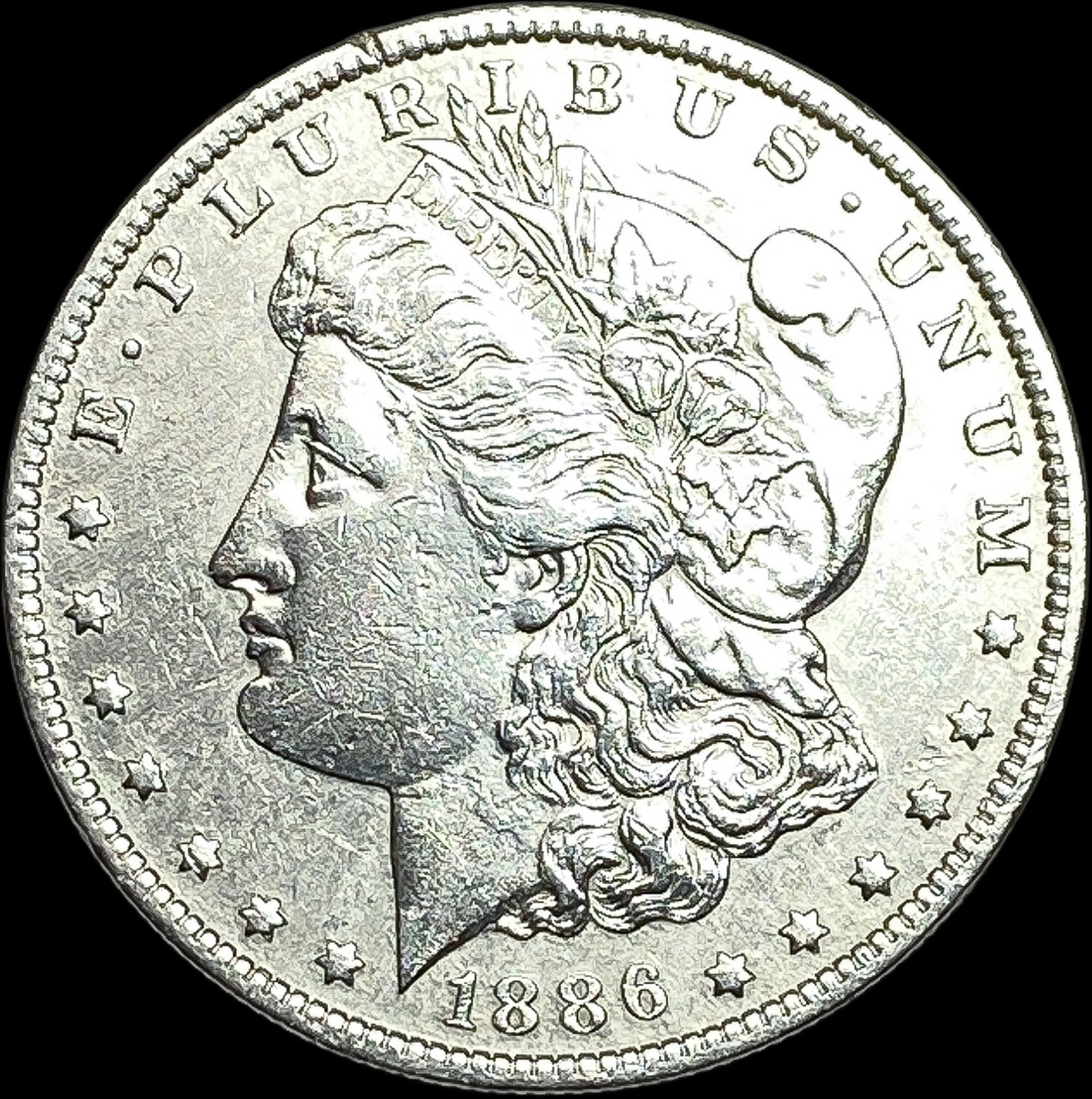 1886-O Silver Morgan Dollar CLOSELY UNCIRCULATED (1 of 2)
